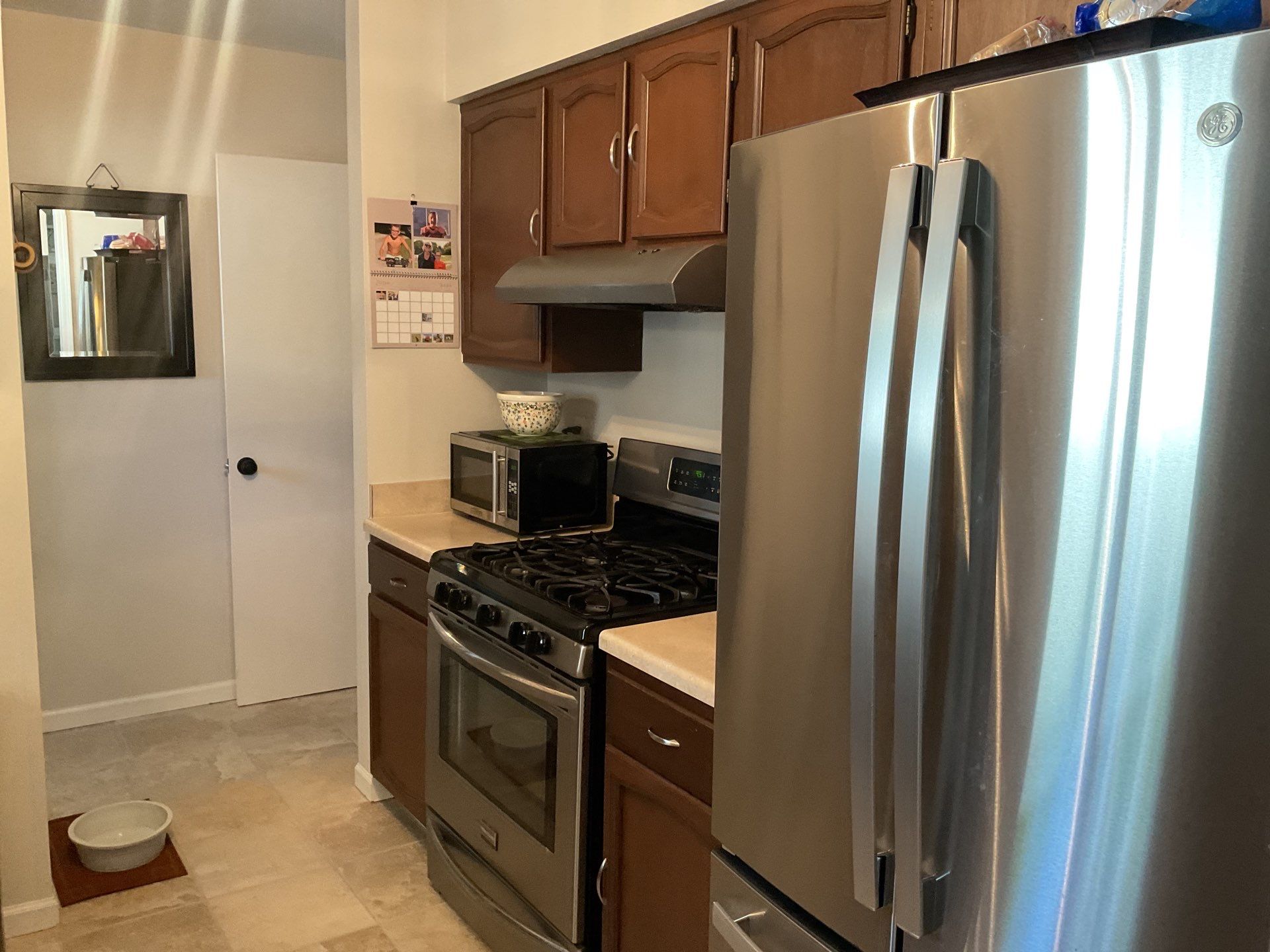 Kitchen Cabinet Refinishing and Butcher Block Countertop Installation in Fenton by Top Shelf Painter