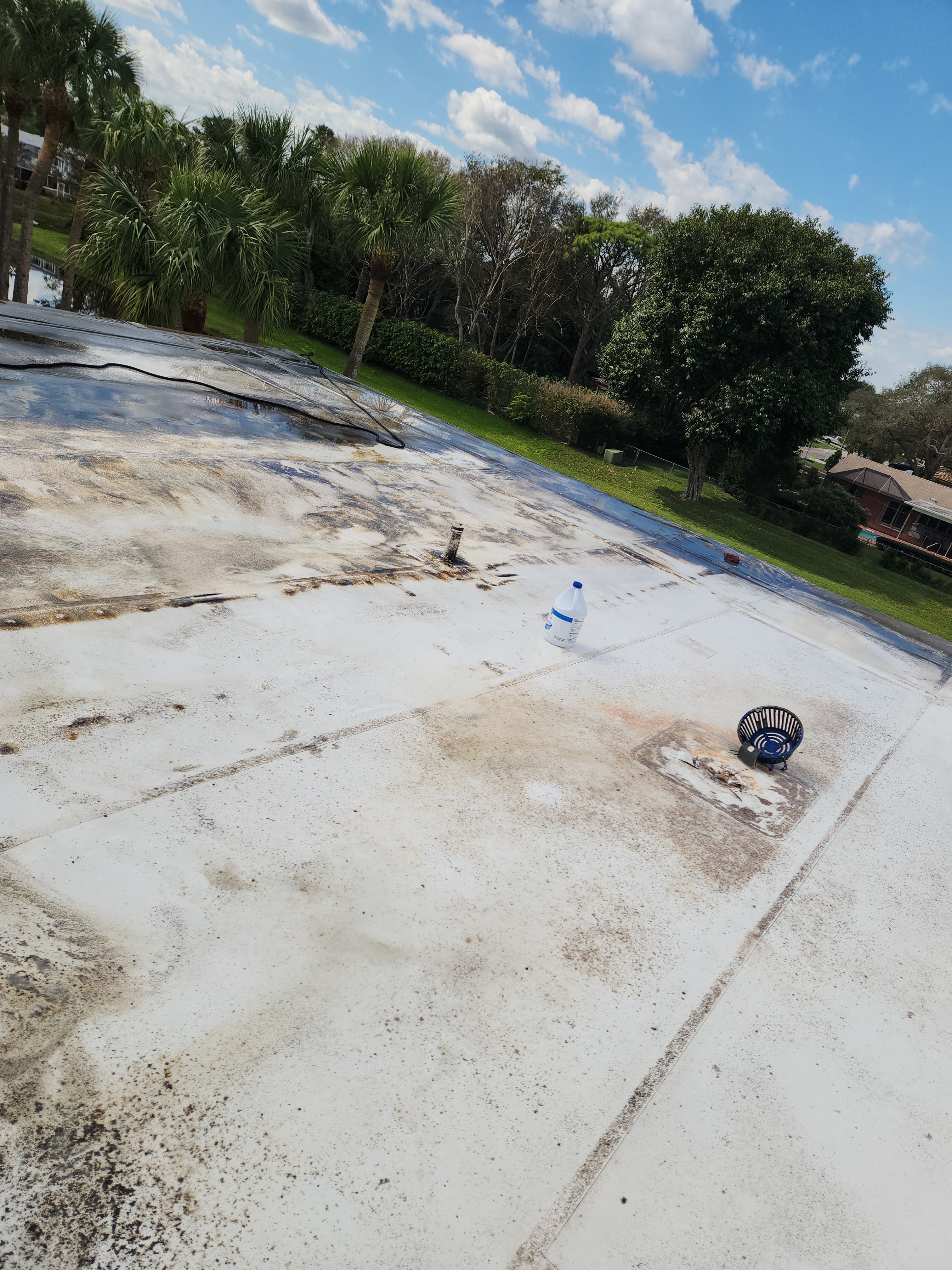 Reflective Silicone Roof Coating and Maintenance in Palm Beach Gardens by Aastro Roofing