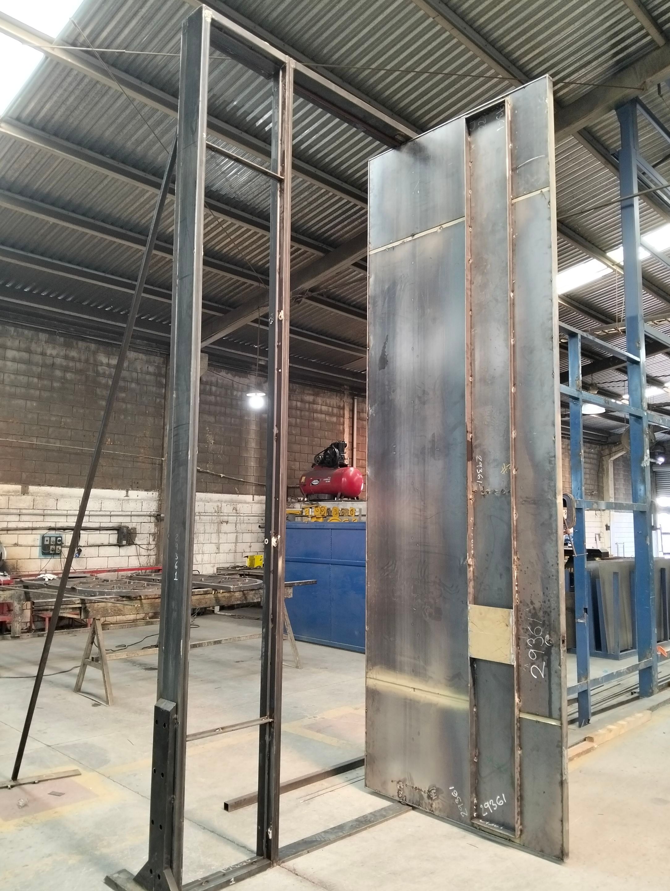 Custom Pivot Door and Structural Steel Frame Installation in Fort Worth by Solara Custom Living