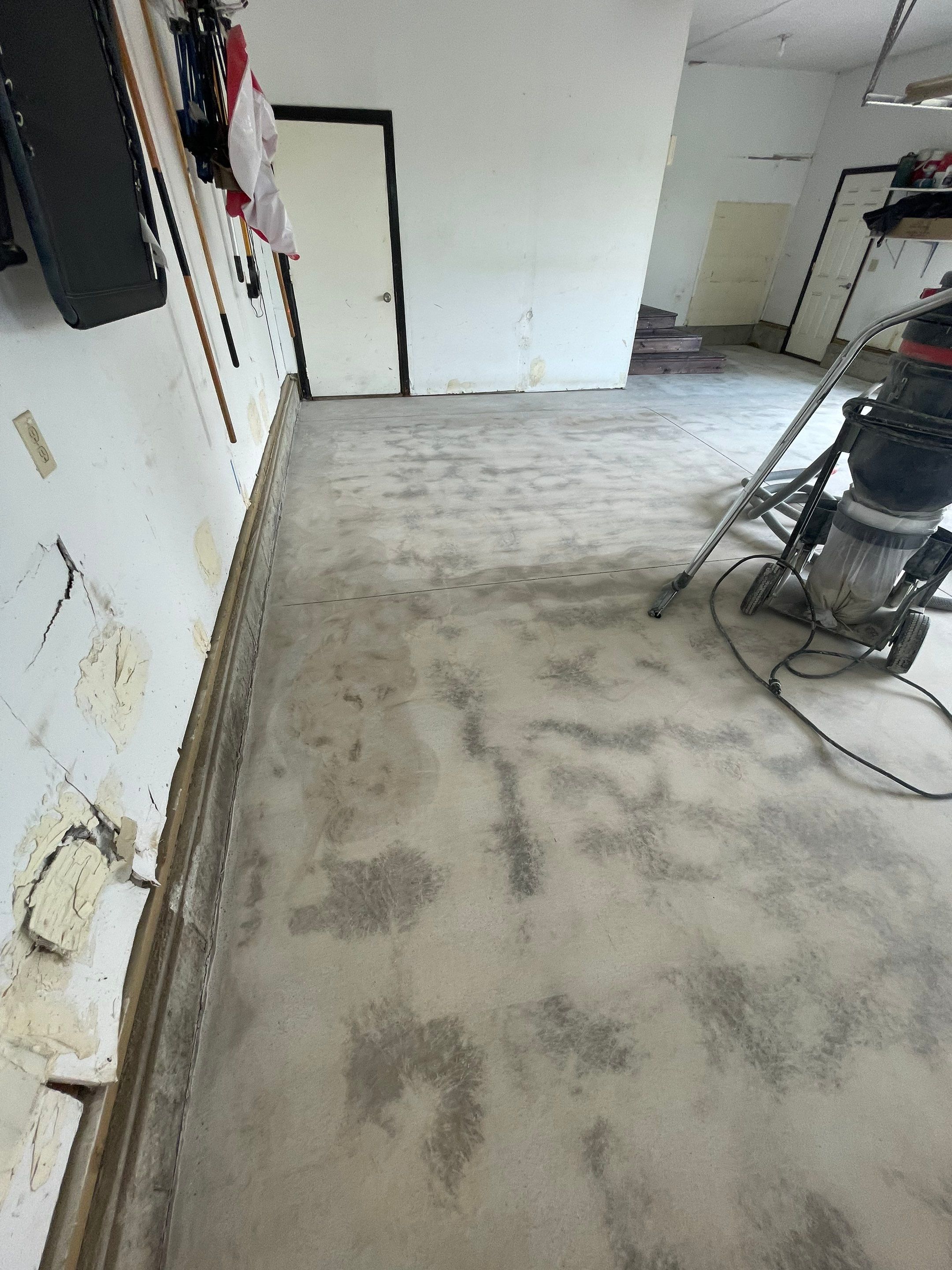 Hartford Residential Garage Floor Transformation With Decorative Chip Coating by Select Painting, Coatings & Garage Cabinets