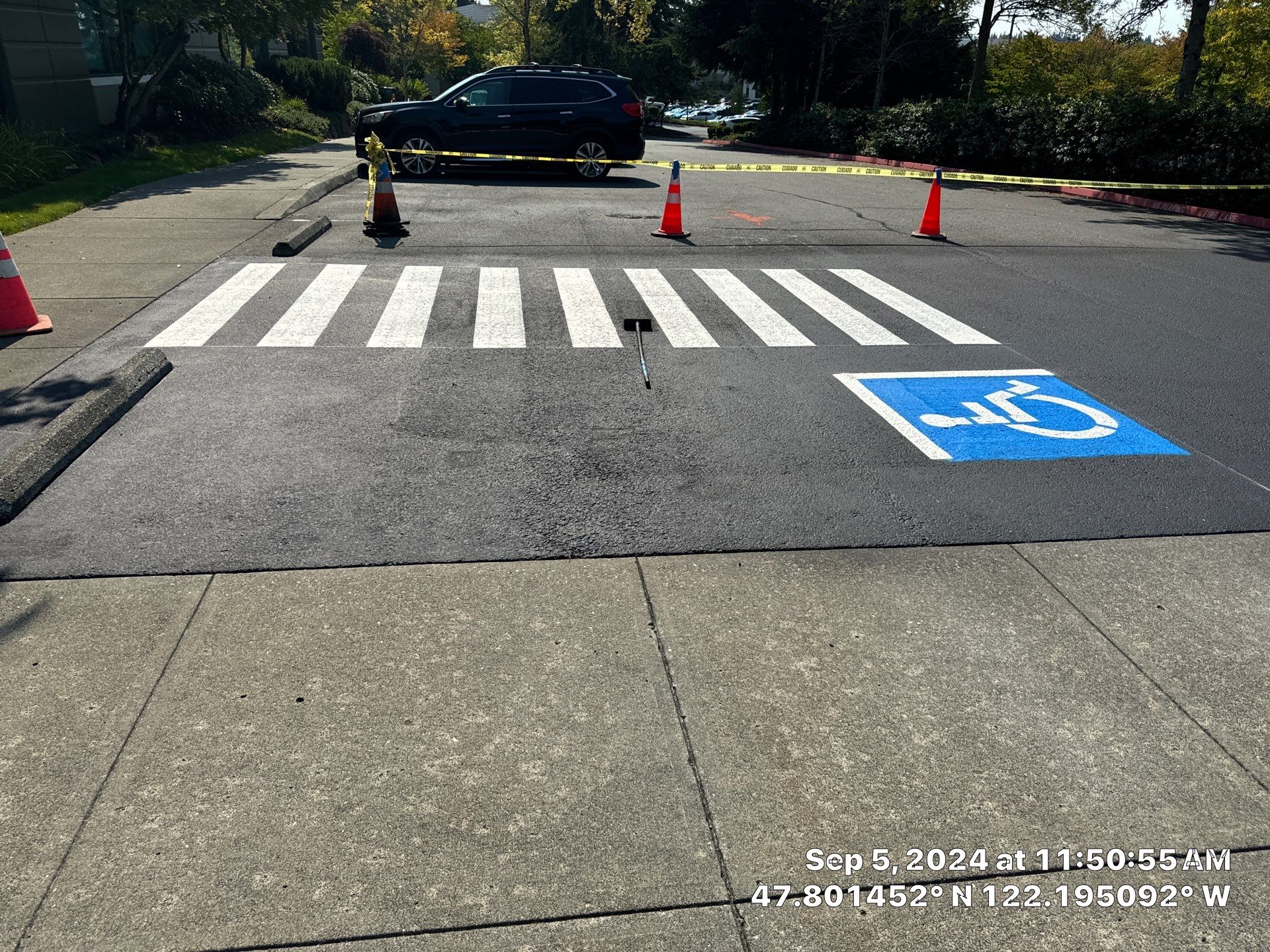 Kidder Matthews | Parking Lot Sealcoating & Striping with Concrete Curb & Patch Repairs  by Jireh Asphalt & Concrete Inc 