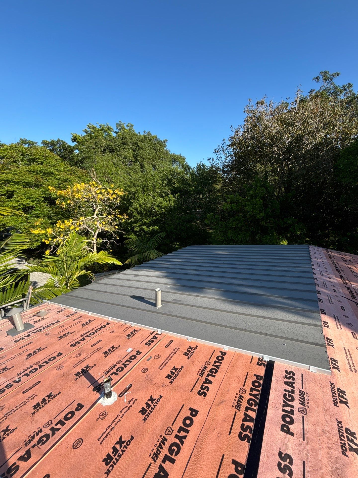 Metal Roof Replacement by Art's Roofing & Construction