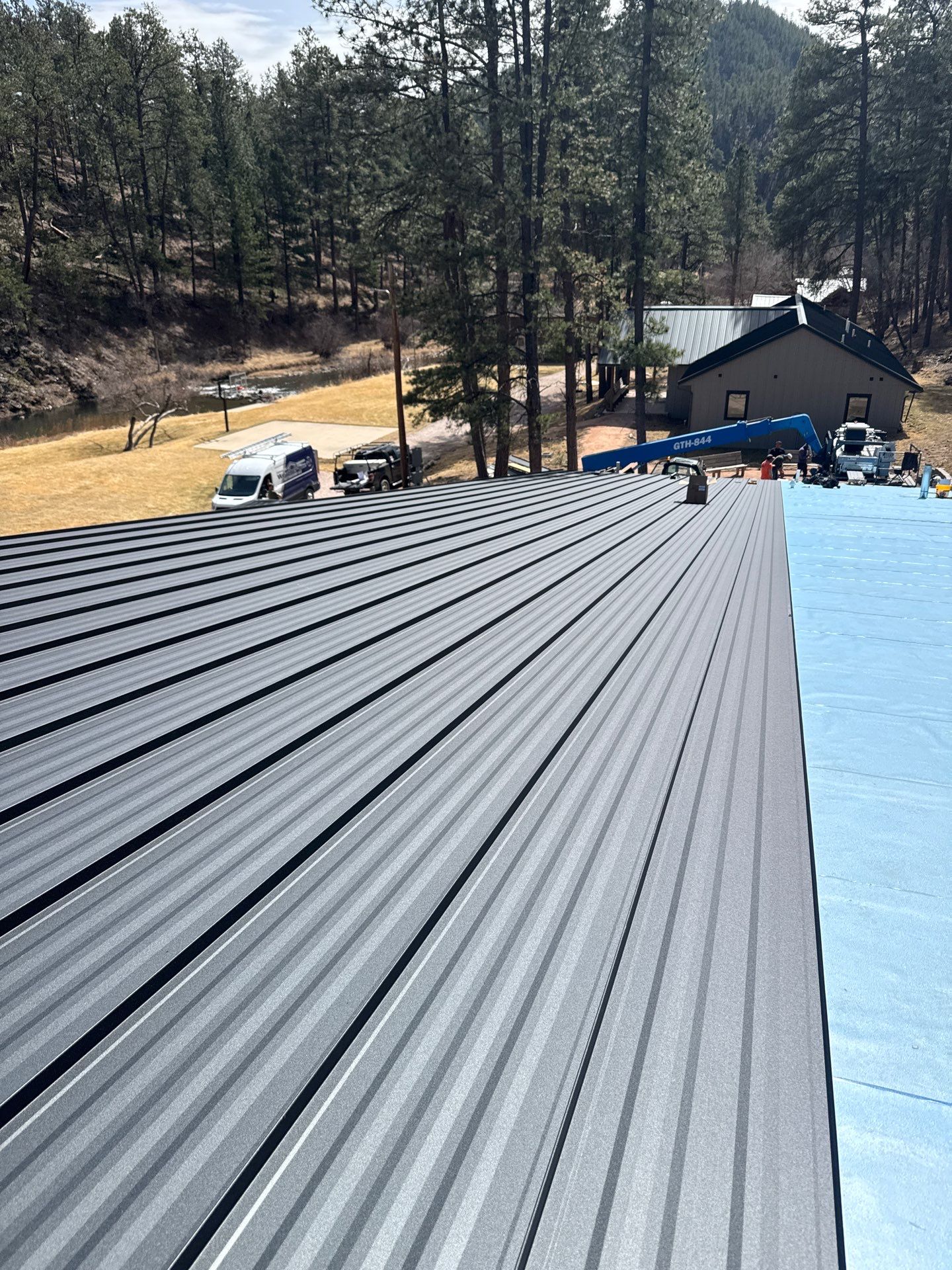 Residential Roofing Installation using Steel Roofing by Weather-Tite Exteriors LLC