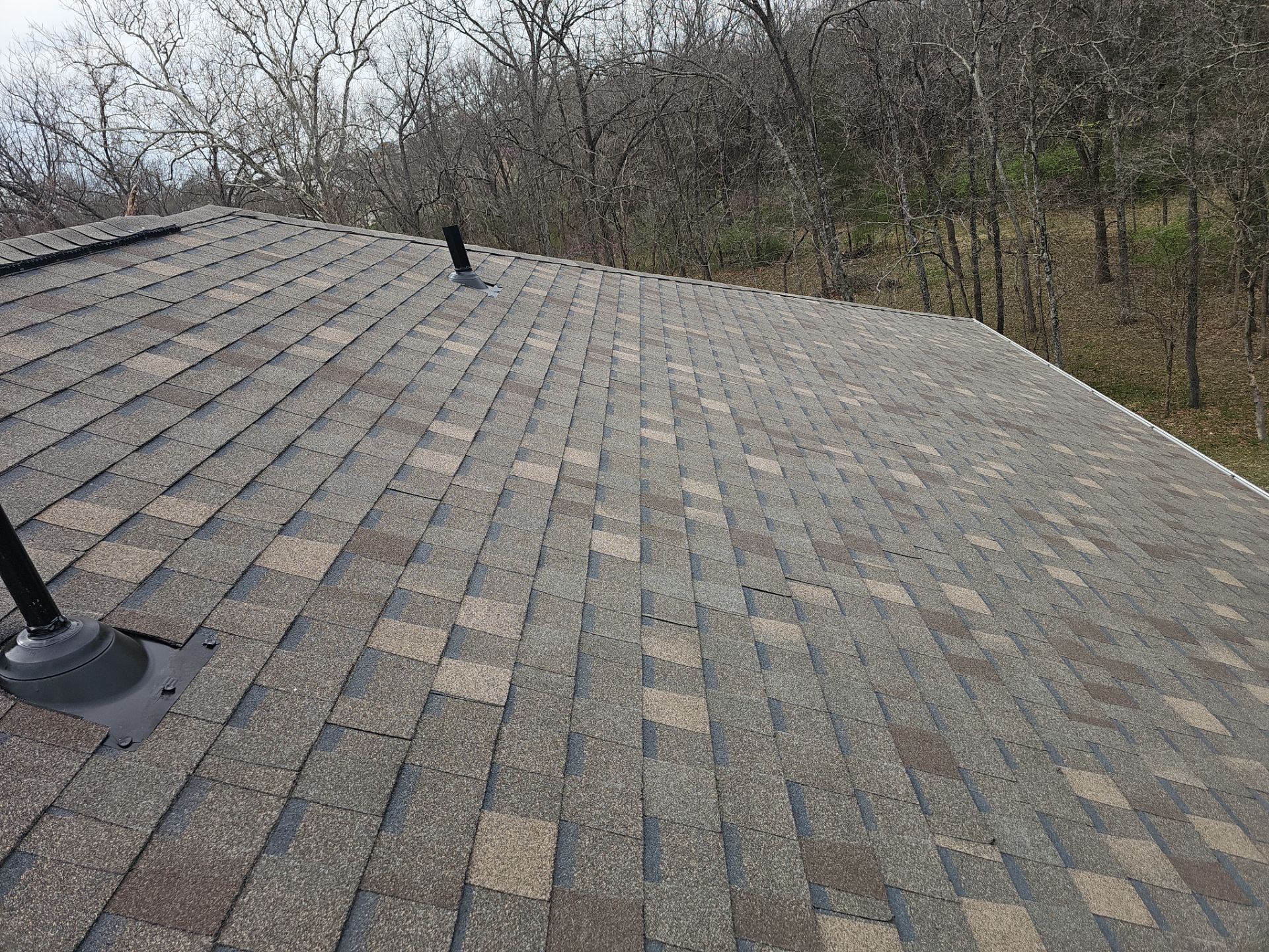 Residential Roofing & Gutter Cover Install  by Titan Commercial & Residential Roofing 