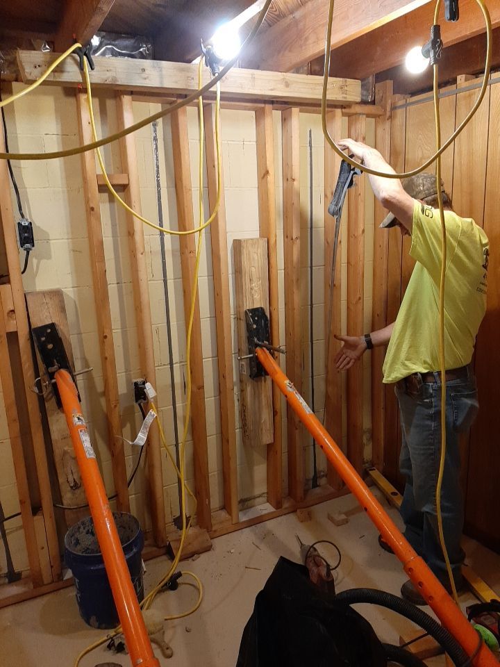 Wall Straightening and Reinforcement using Embedded Fiber Reinforcement by Toledo Basement Repair 
