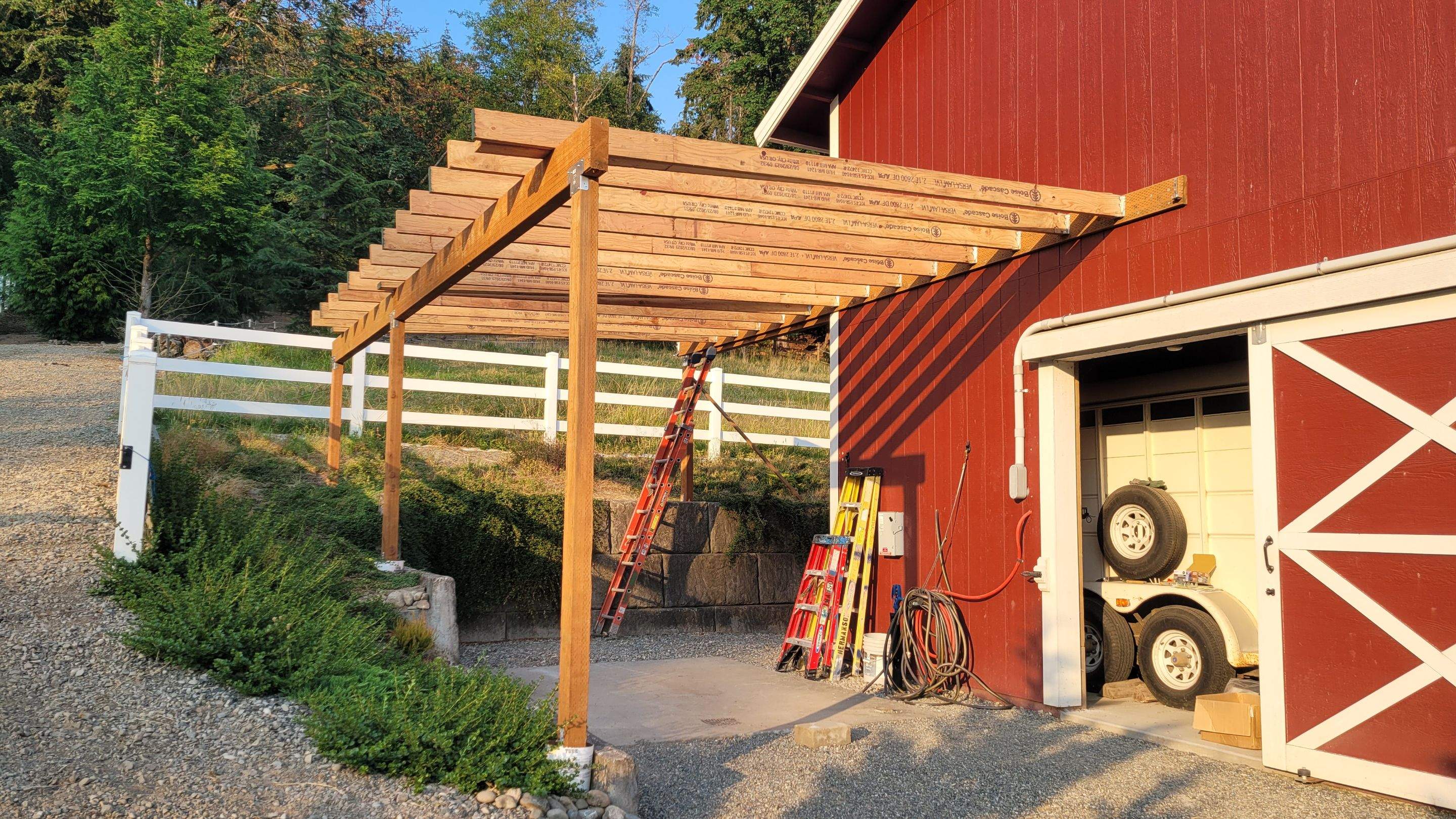 Carport on the Barn by RoofWorks Northwest
