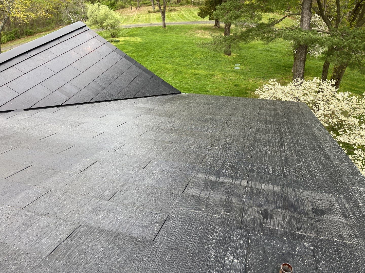 Tesla Solar Roof Replacement by American Home Contractors