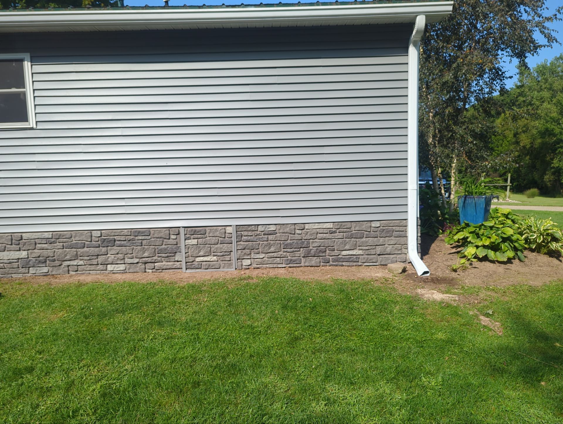 Siding Installation using CertainTeed Monogram Siding and Tando Stone. by Energy Plus Home Improvements