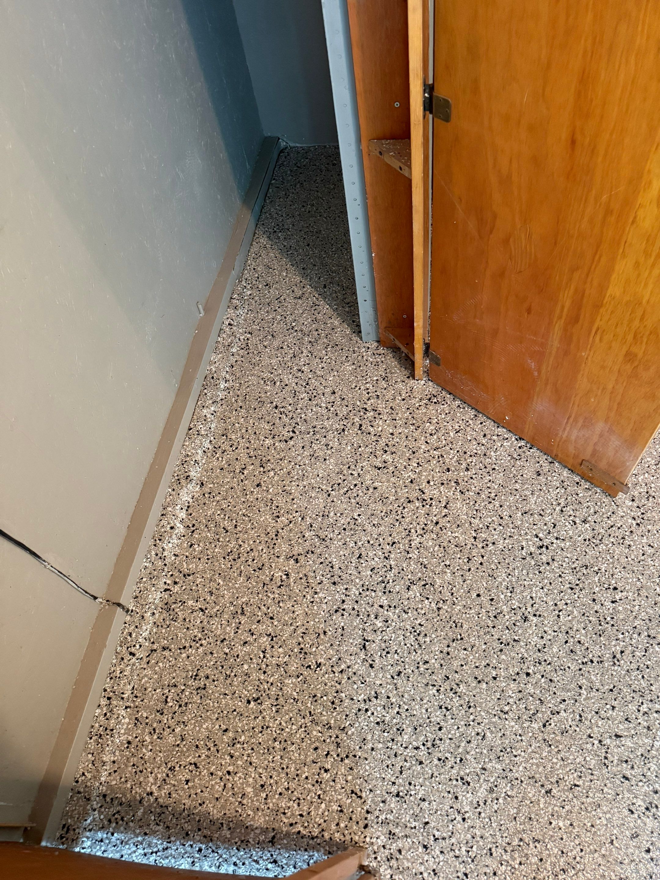 Cabin Fever Concrete Coating for Sioux Falls Garage by Select Painting, Coatings & Garage Cabinets