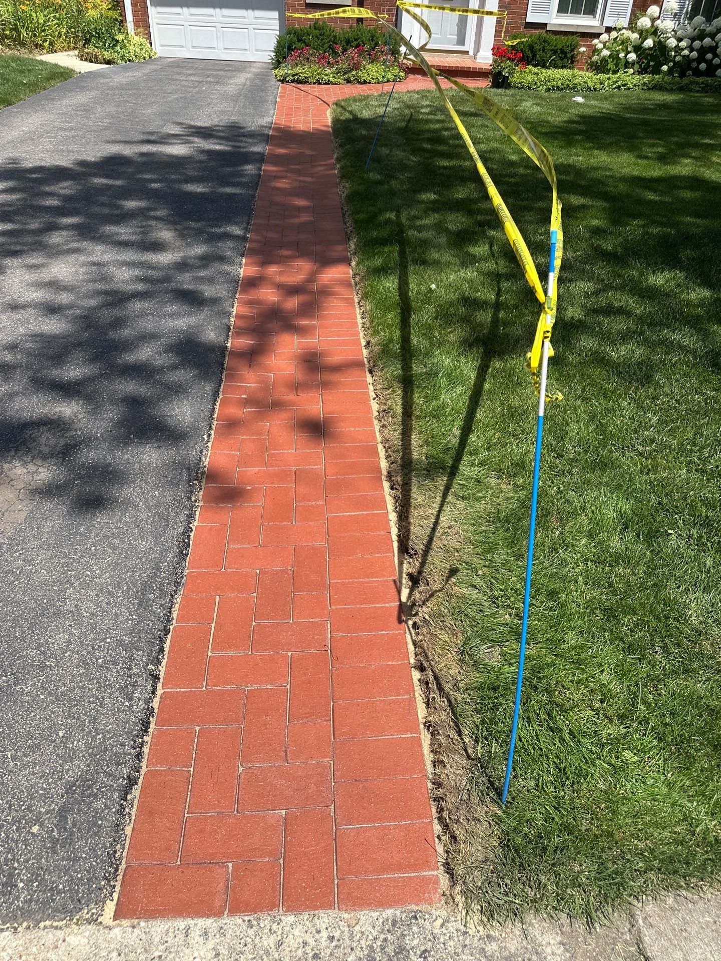Brick Paver cleaning, sanding, seal by Northern Power Washing LLC.