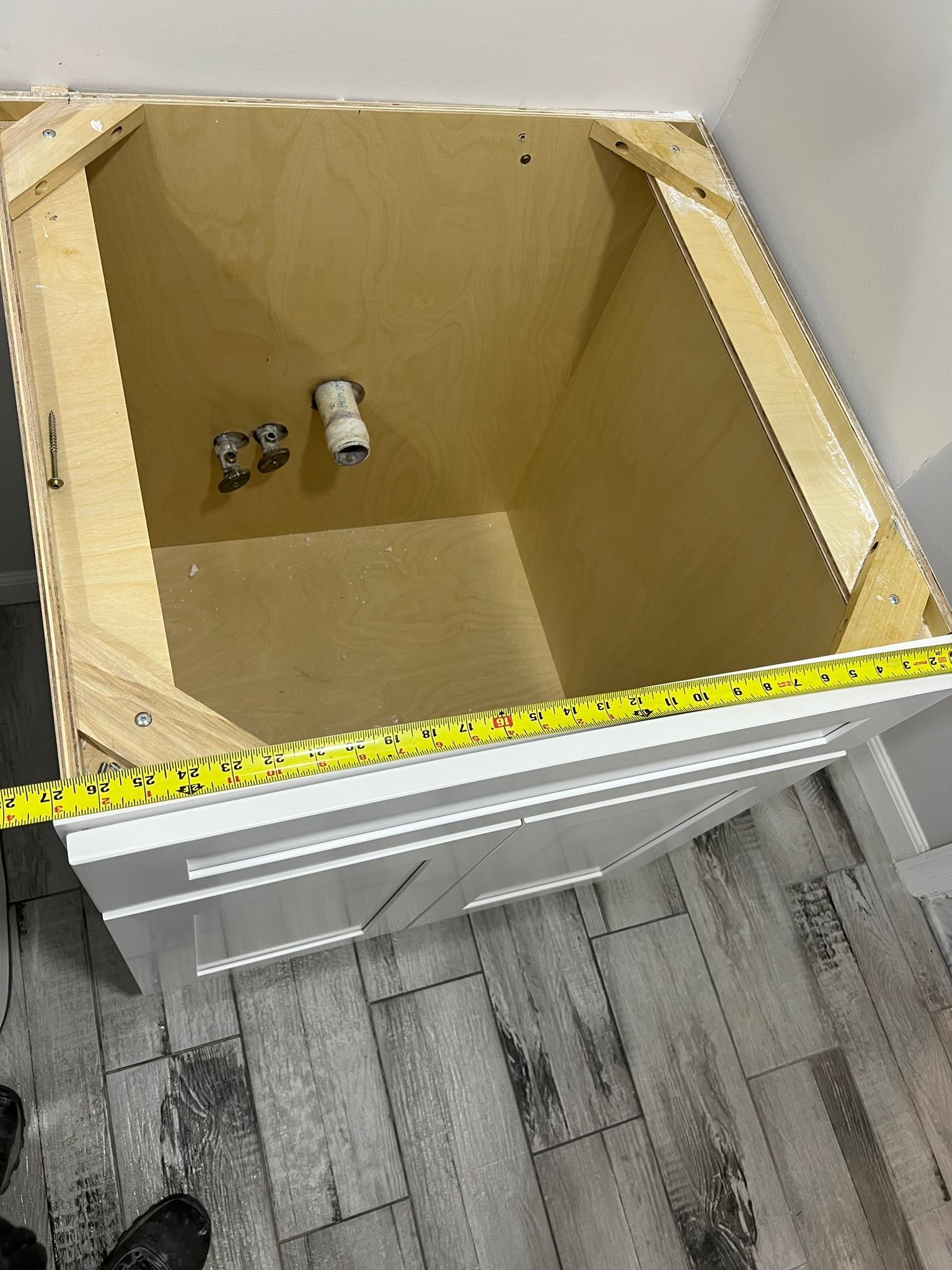 Bathroom Remodel using Cabinets by Home Concepts Construction