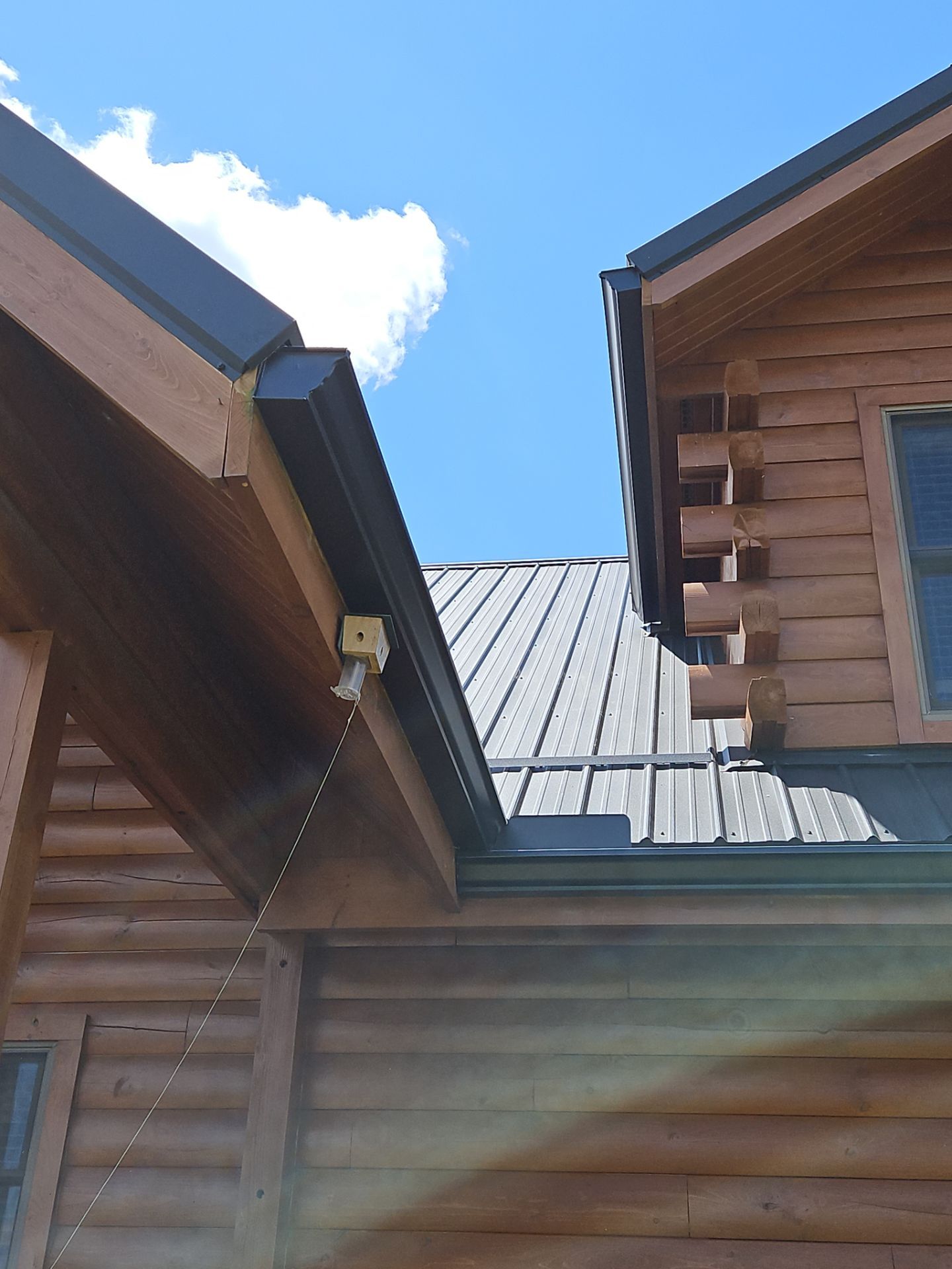 Residential Roofing Installation using Performance Panel Metal - Frost Black by RoofX 