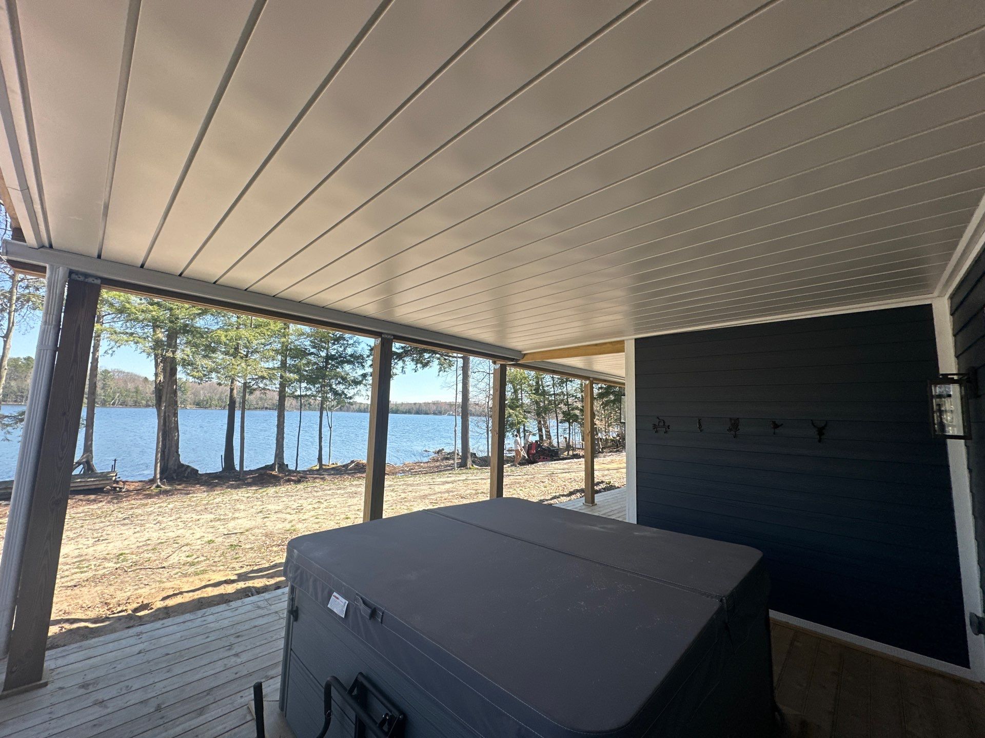 Gutter Helmet and Underdecking Installation for Alden Lakefront Home by Rainbow Seamless Systems