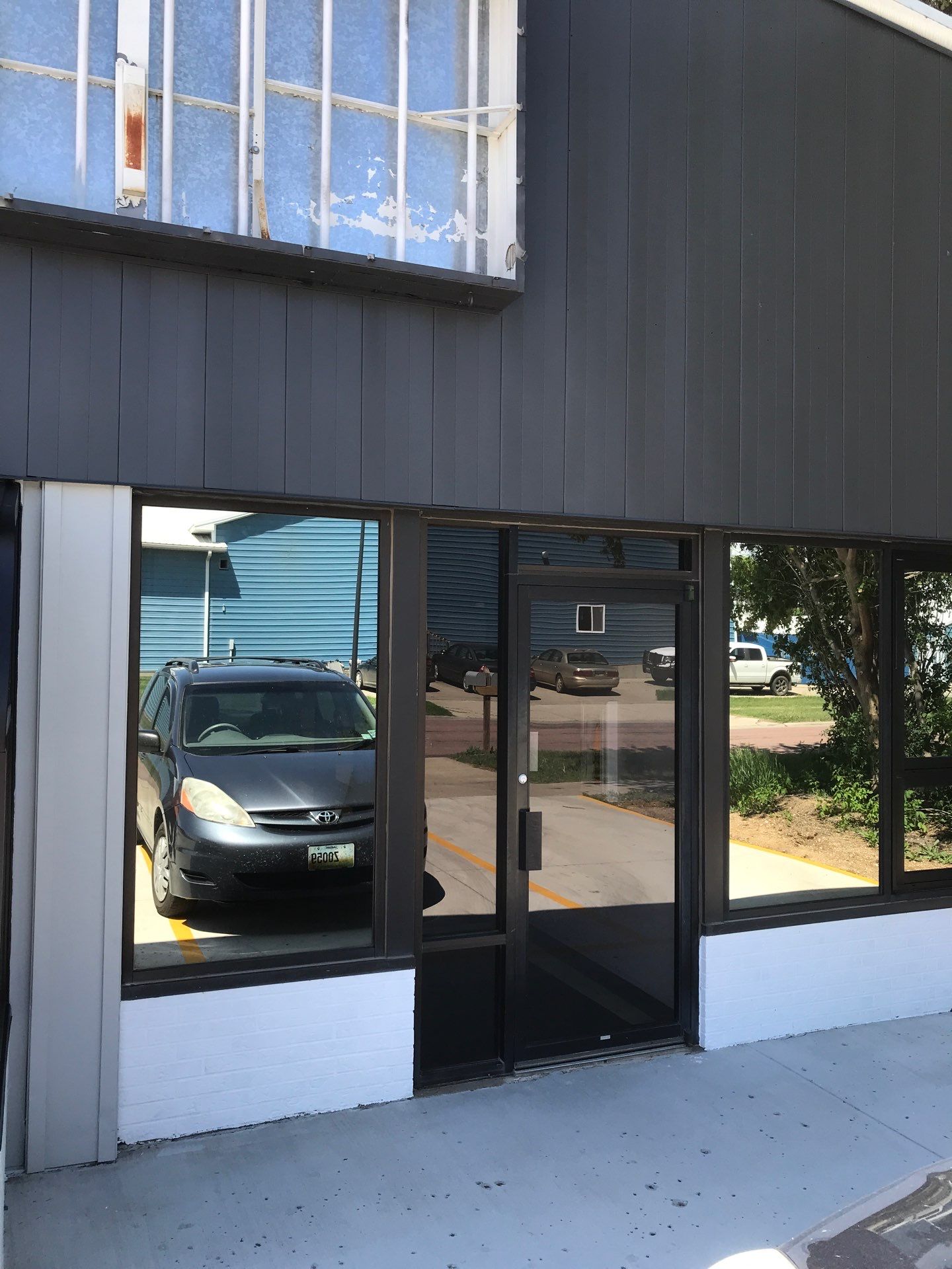 Commercial Shop Renovation and Concrete Parking Installation in Brookings by Select Painting, Coatings & Garage Cabinets