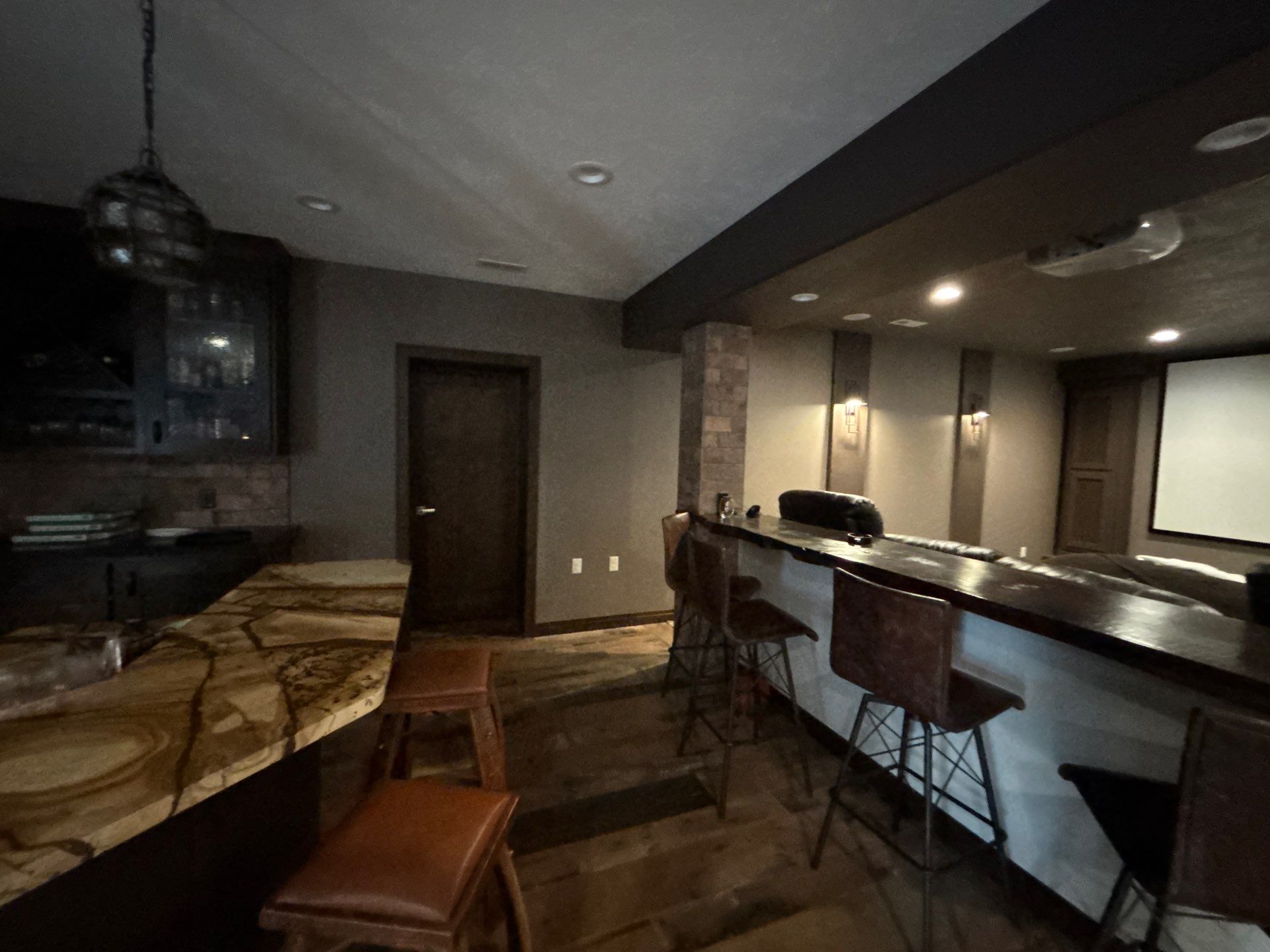 Custom Interior Painting for Basement Theater and Bedrooms in Sioux Falls by Select Painting, Coatings & Garage Cabinets