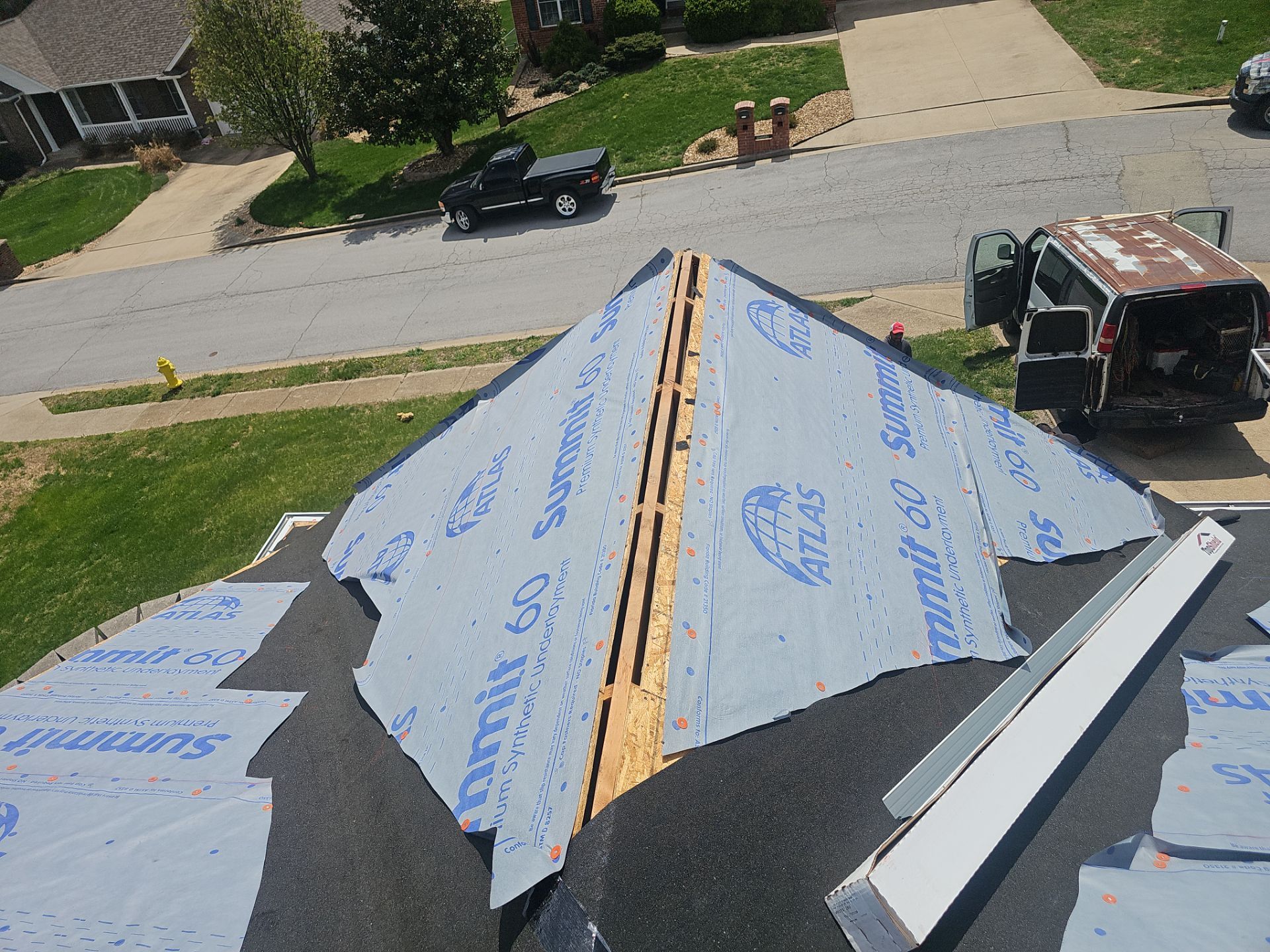 Residential Roof + Gutters & Downspouts Install  by Titan Commercial & Residential Roofing 