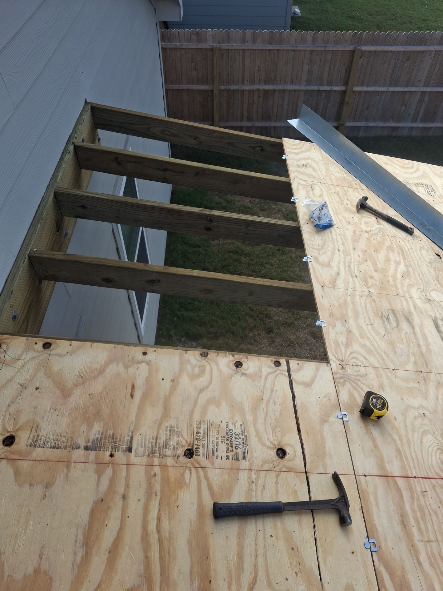 Patio? We got you Covered! by Bayfront Roofing and Construction