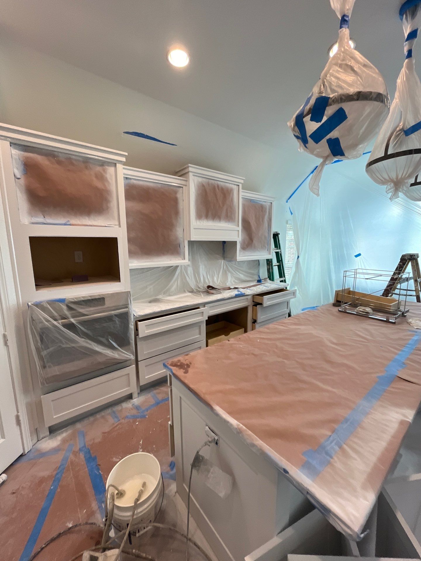 Kitchen Remodel using Water mitigation equipment by L&T General Contractors and Restoration INC