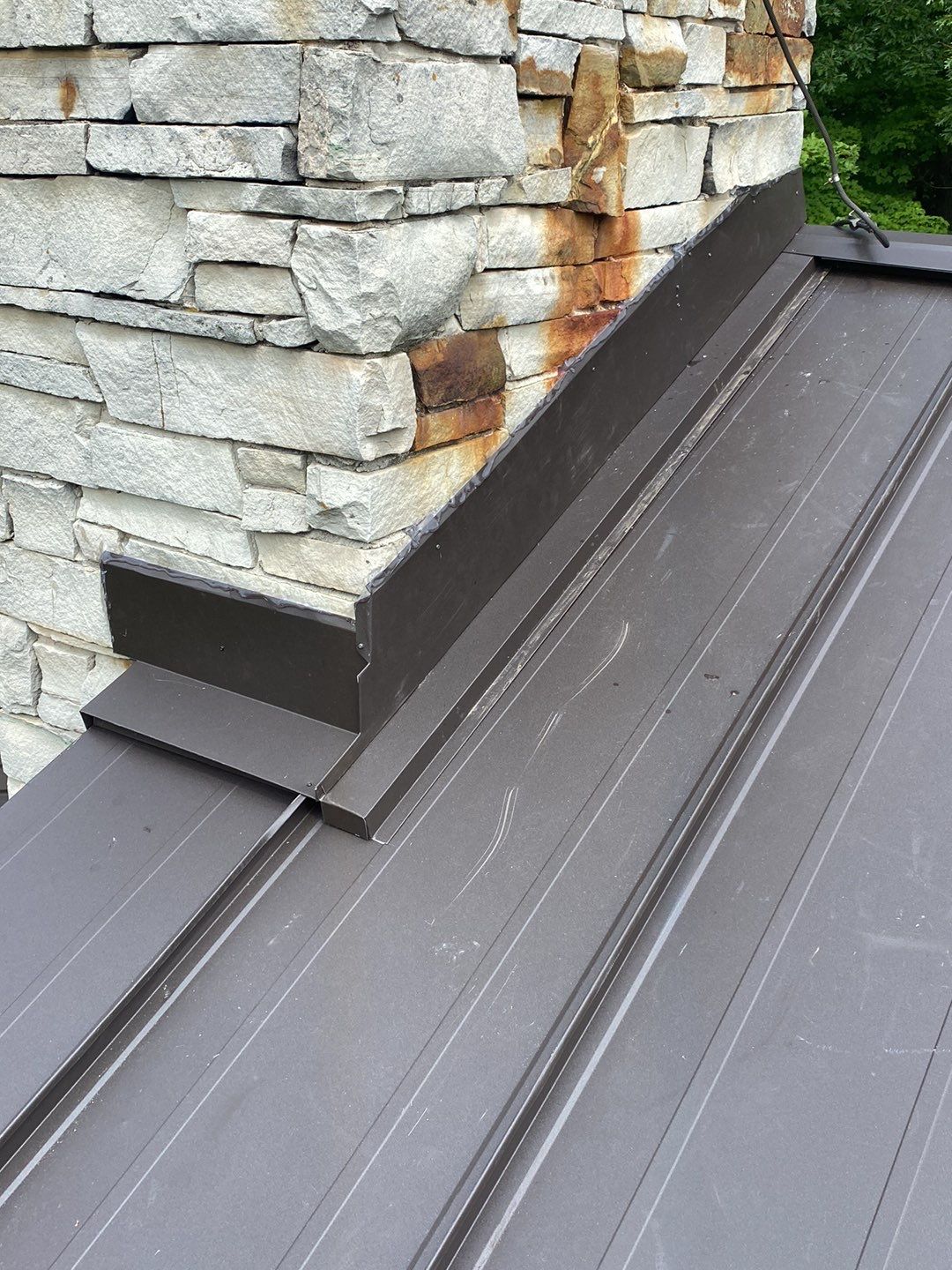 Roof Replacement using 16" Standing Seam Panels by Jay Carter Roofing & Sheet Metal