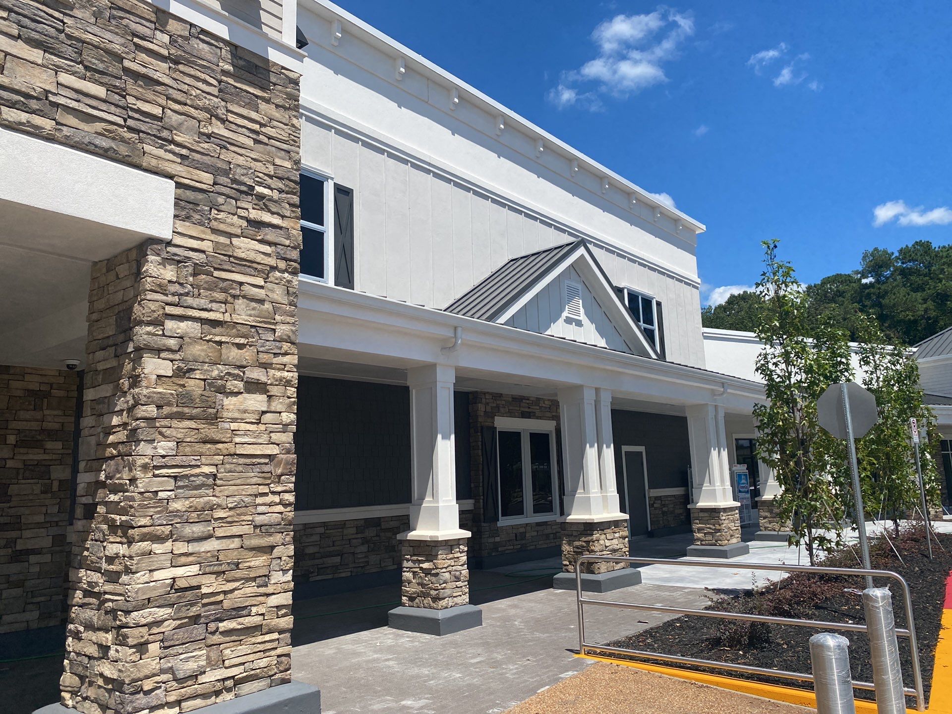 Commercial Roofing Installation using Berridge 11 1/2" Cee Lock .032 Aluminum Charcoal Grey by Infinity Metal Systems