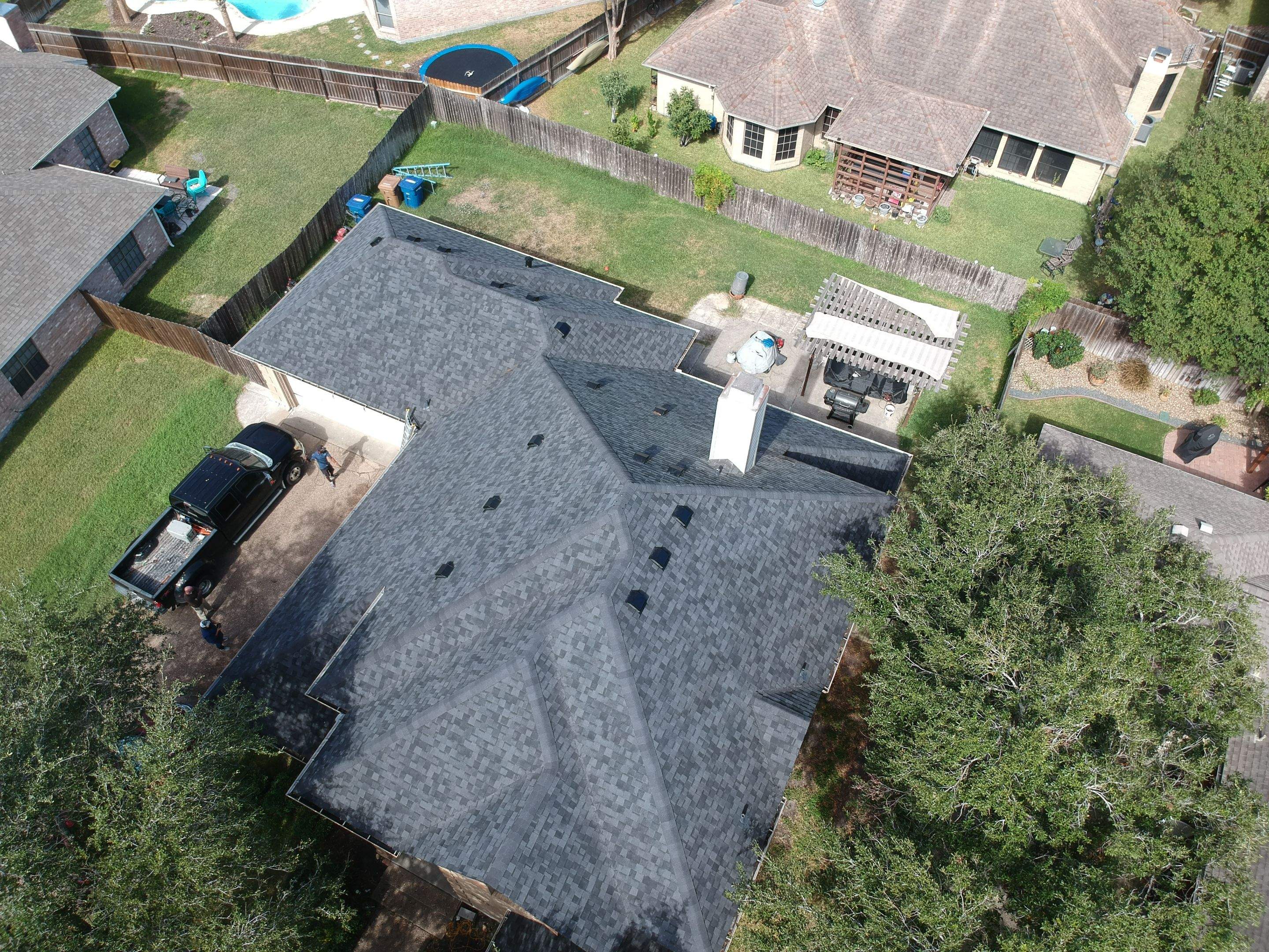 Residential Roofing Installation using Certainteed Landmark Moire Black by Galvan Roofing and Construction