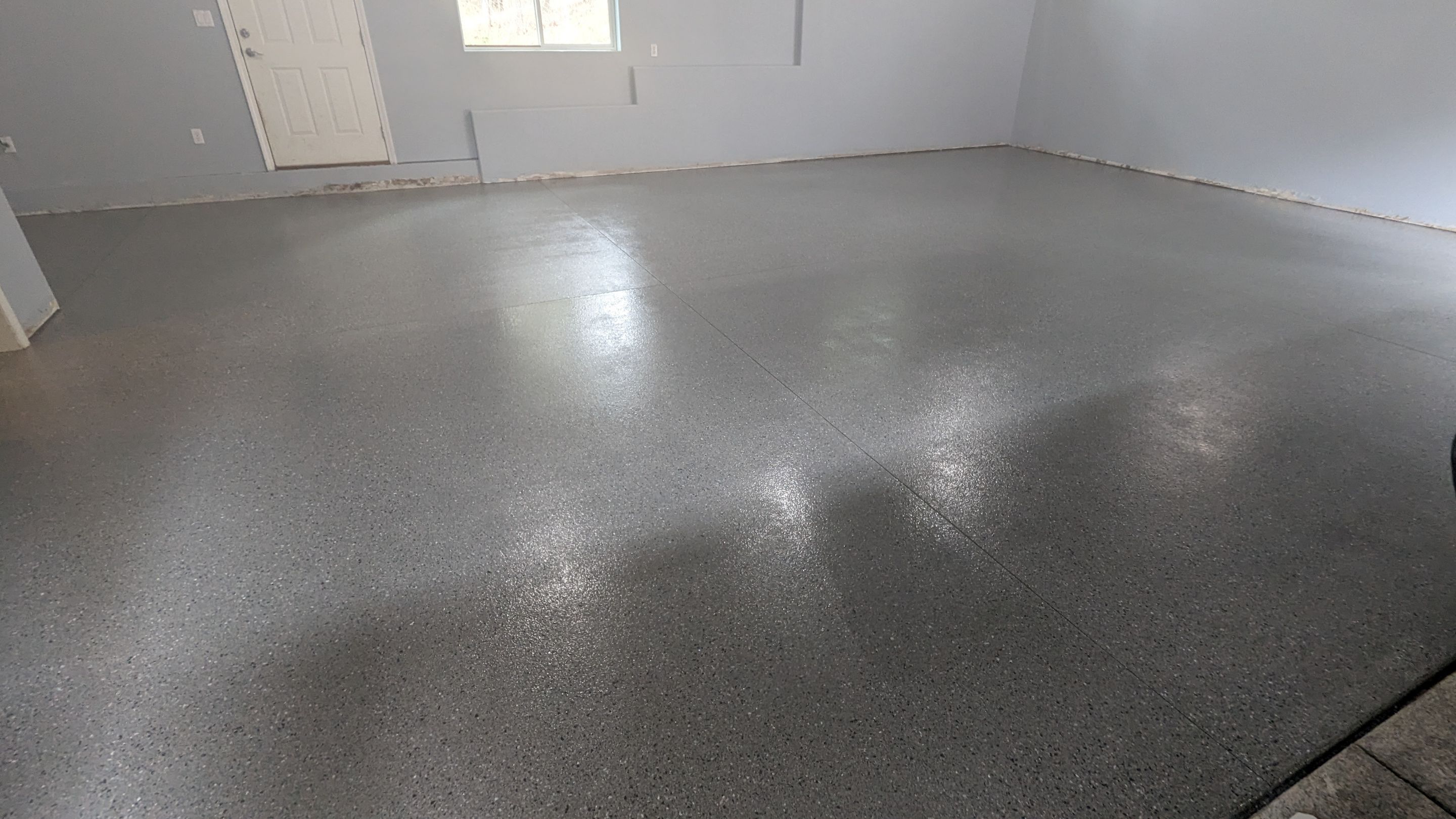 Garage Transformation using Slate Hybrid by Croc Coatings, LLC