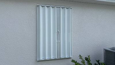 Accordion Shutters in White