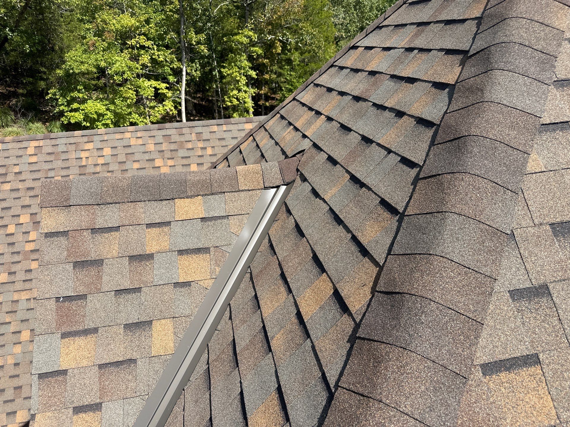 Residential Roofing + Gutters & Downspouts & Gutter Guards Install  by Titan Commercial & Residential Roofing 