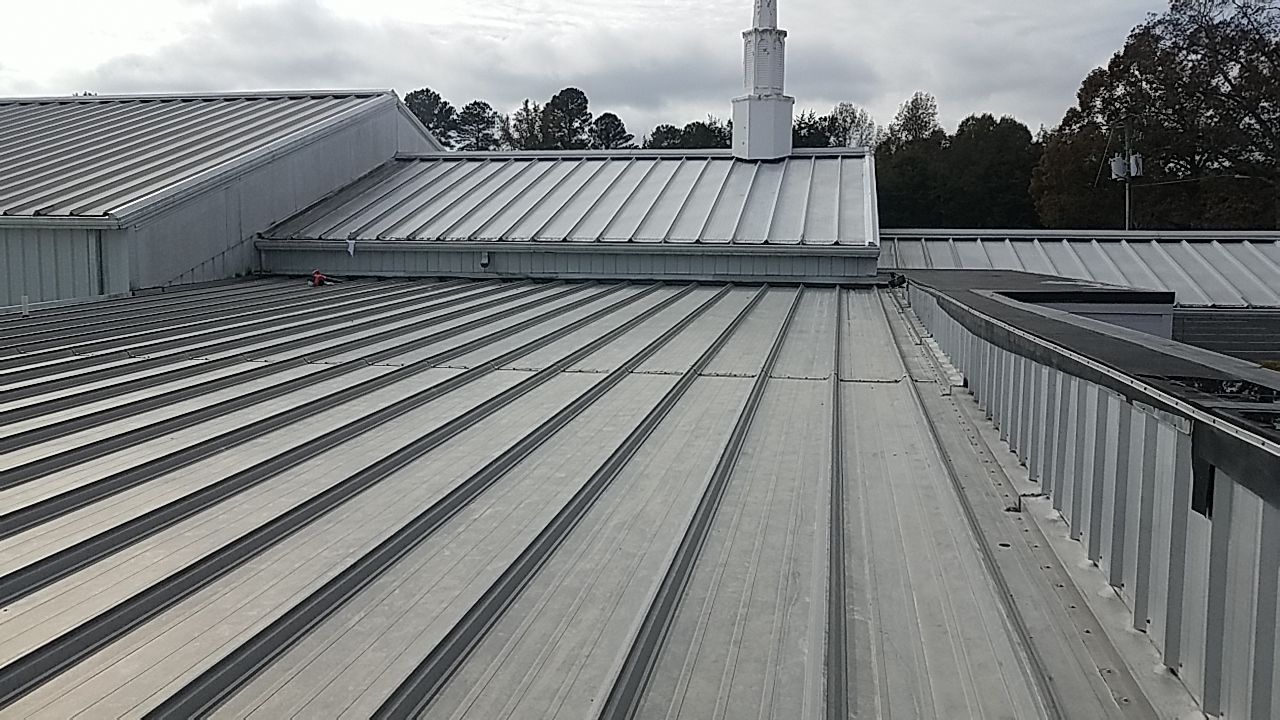 Commercial Roofing Repair using Roof Installation by American Roofing NC