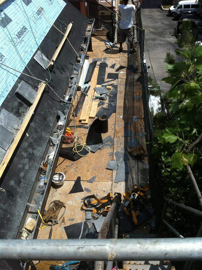 Historic Building ROOF REPLACEMNT with GAF TruSlate  on steep slop and Versico 60mil TPO on flat roof by Gorilla Exteriors Contracting, LLC