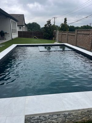 Modern Geometric Pool with Raised Spa and Turf Surround
