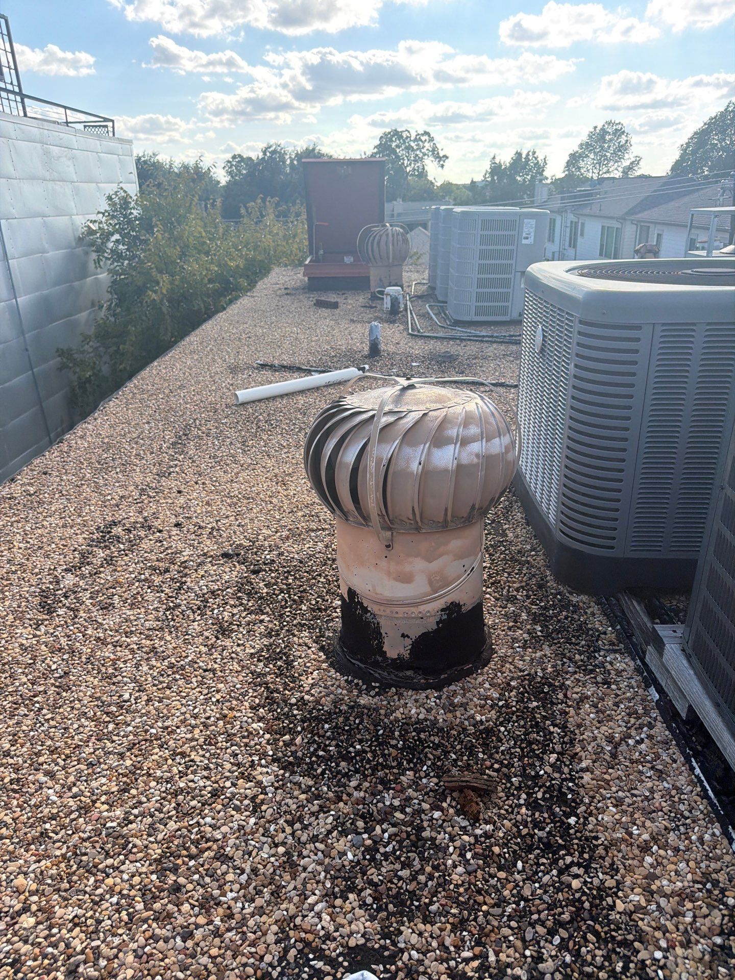 Comprehensive Roof Replacement for Dallas Residential Flat Gravel System by Rich the Roofer LLC