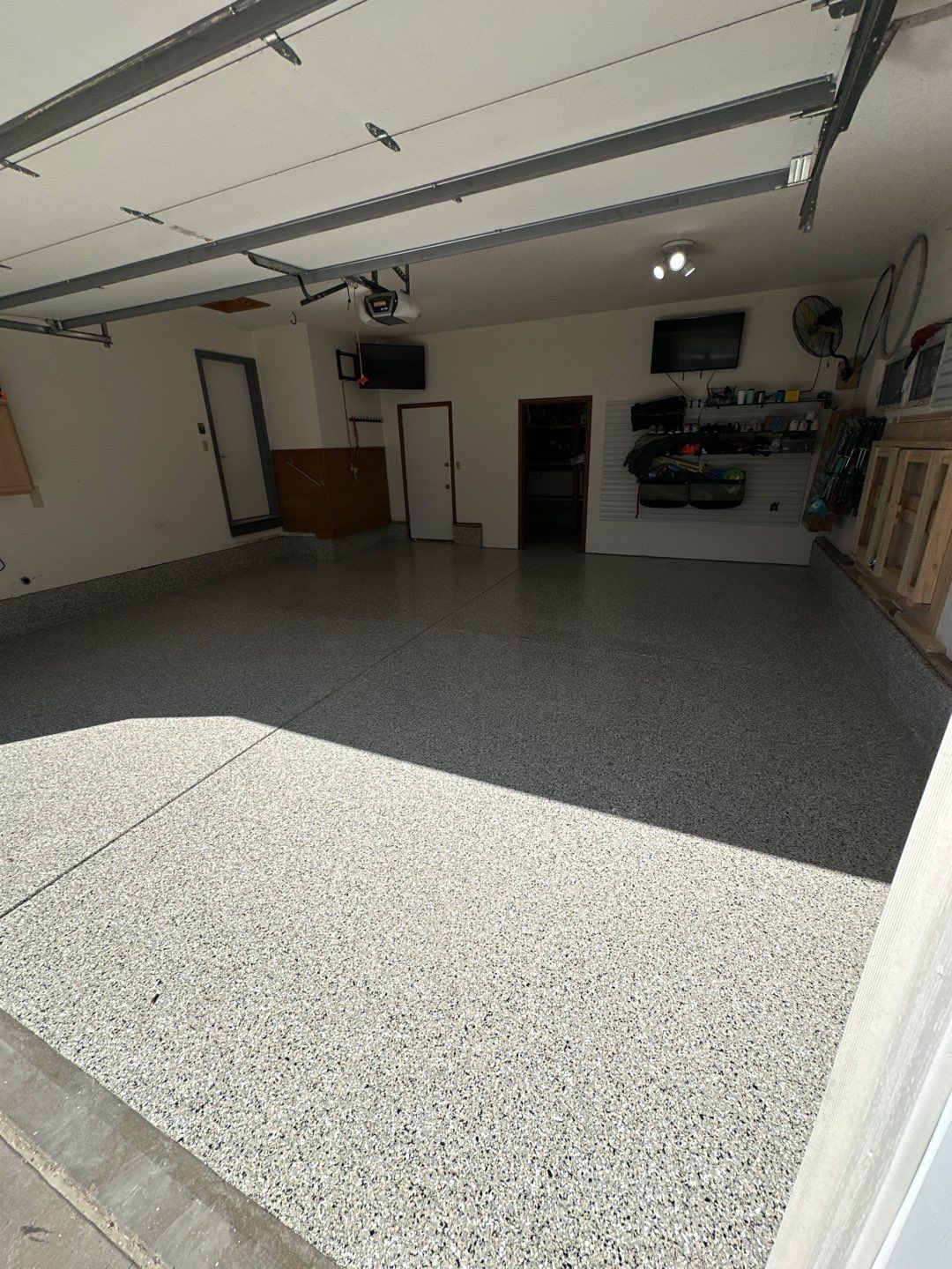 Two-Stall Epoxy Garage Floor Coating and Repair in Lincoln by Goat Coatings