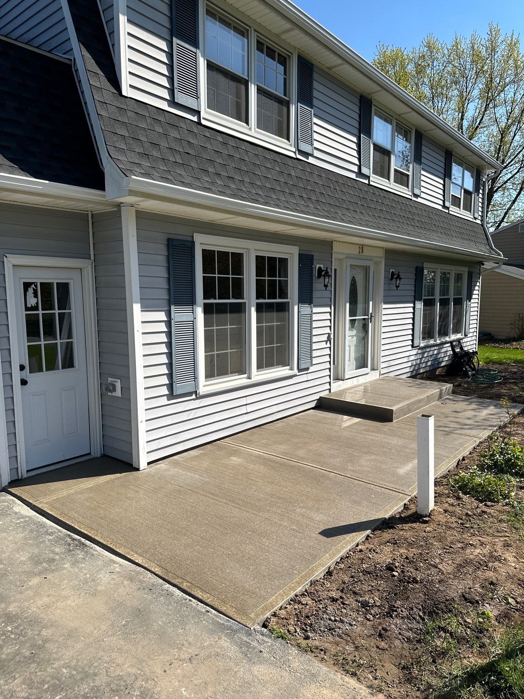 Broom finished front patio  by NG Masonry & Construction LLC