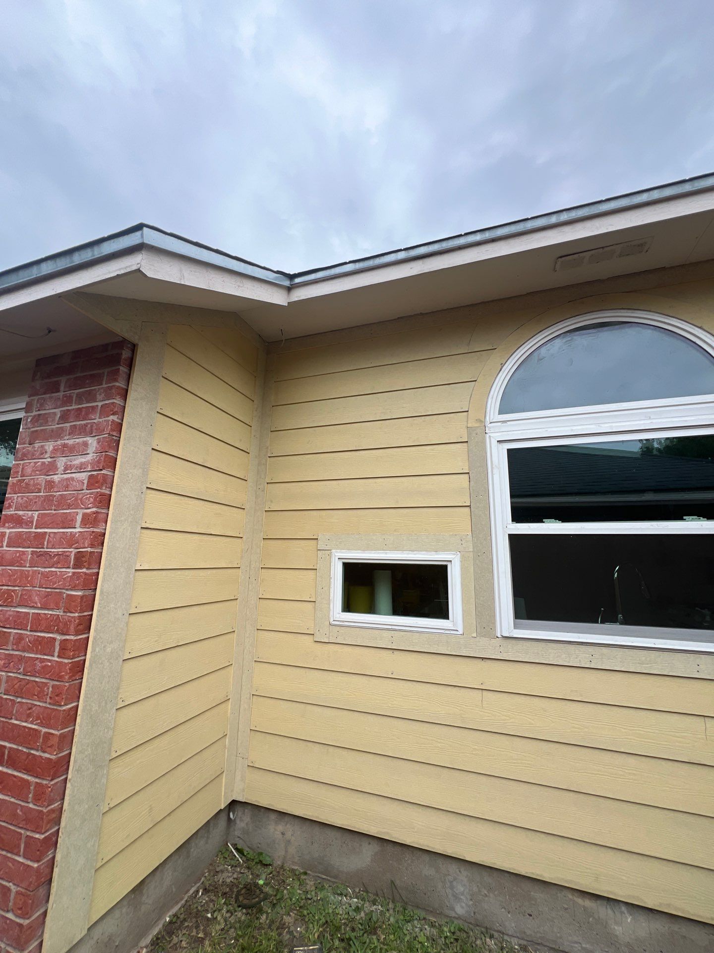 Windows with a side of Siding by Bayfront Roofing and Construction