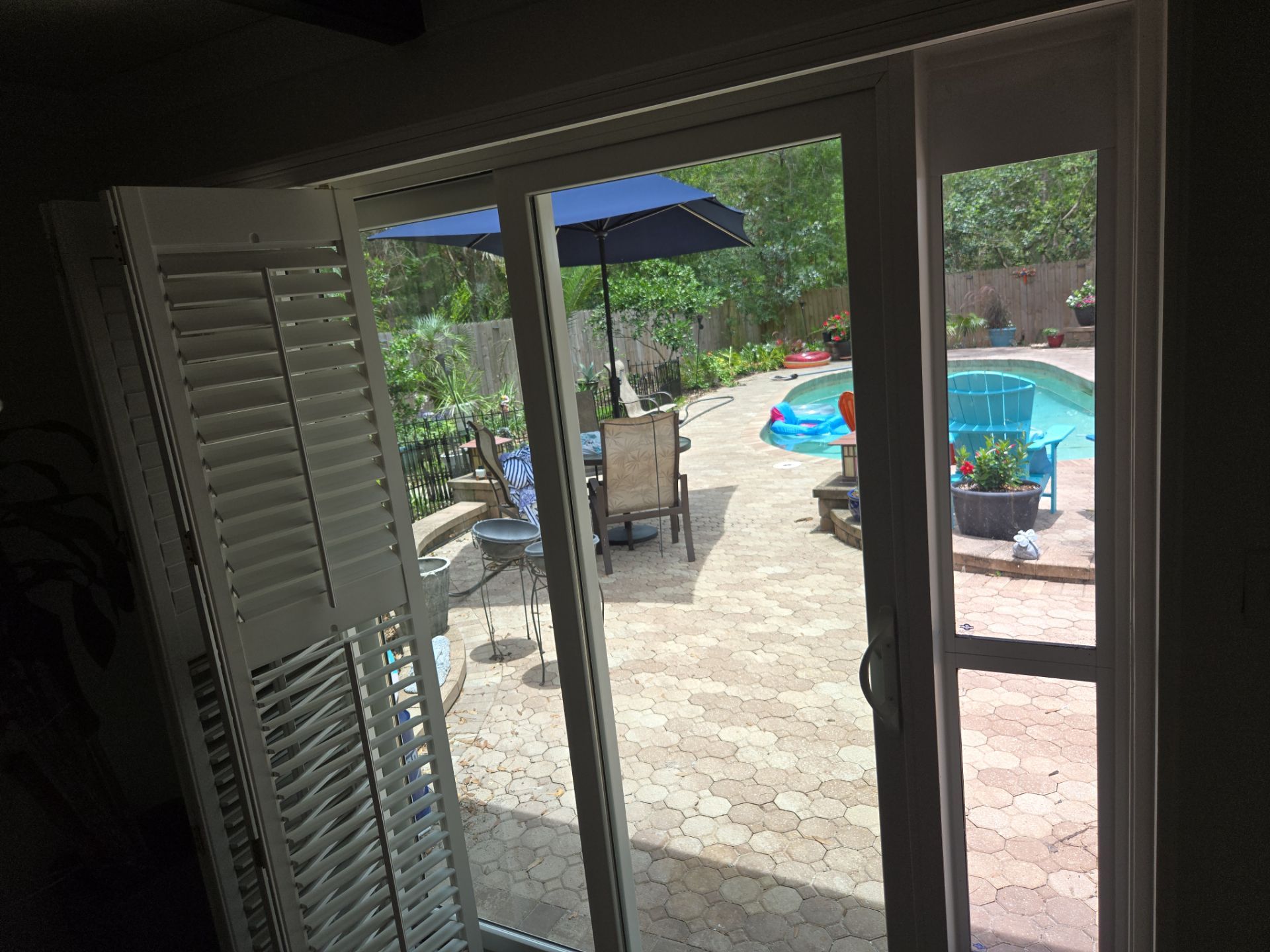Custom Sliding Glass Door Installation with Integrated Pet Doors in Gainesville by Windows & Doors Store