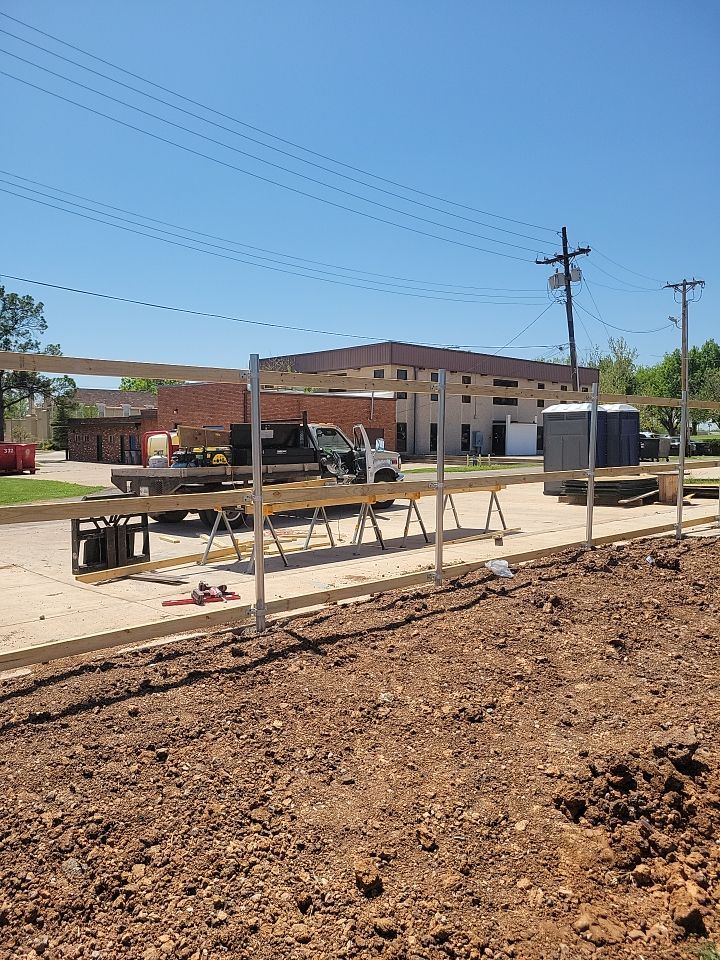 Cedar Fence using Cedar Pickets and Metal Poles by Clays Services Inc