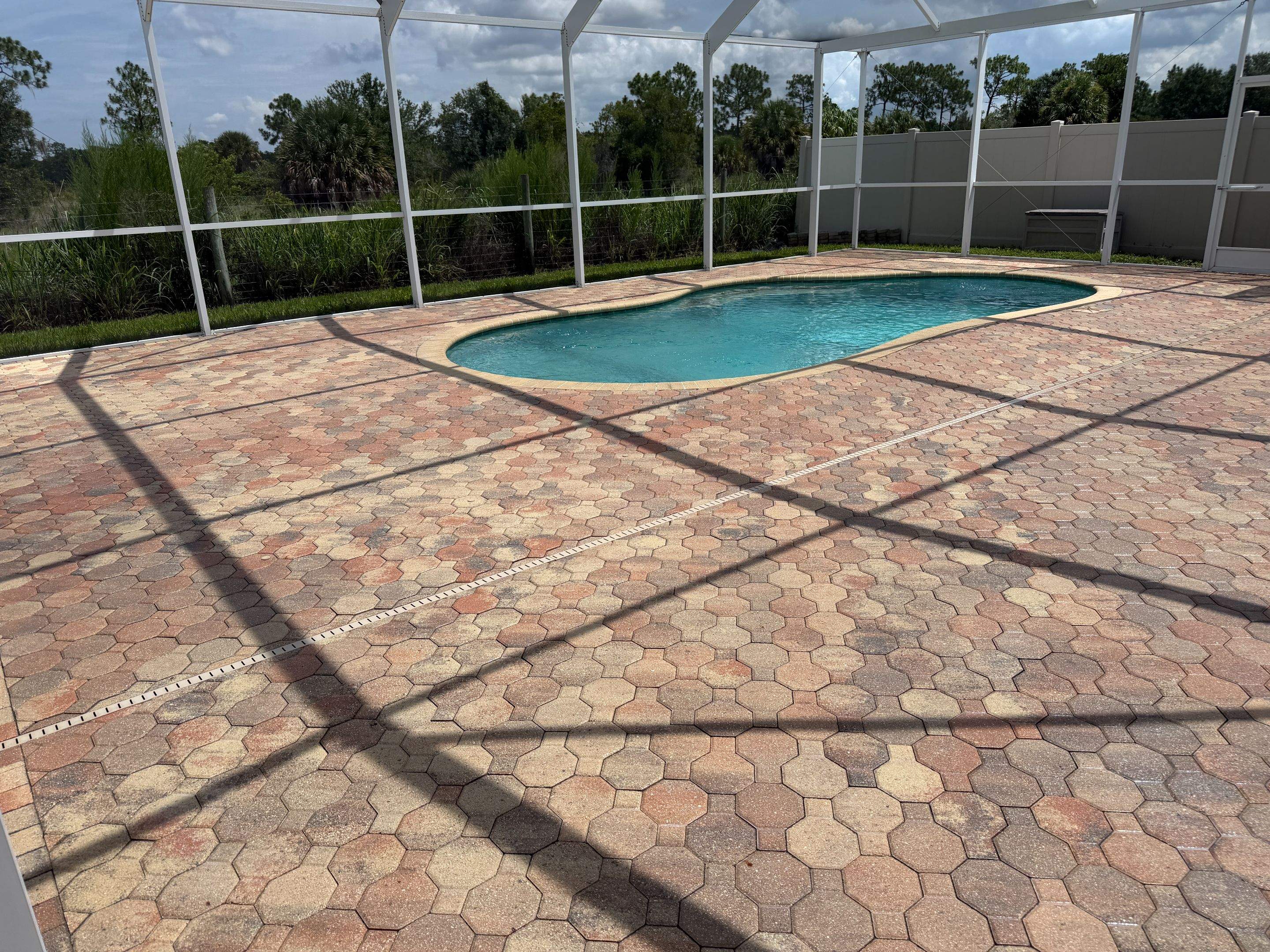 Paver Repair and Protective Sealing for Ruskin Pool Deck by Supreme Paver Experts