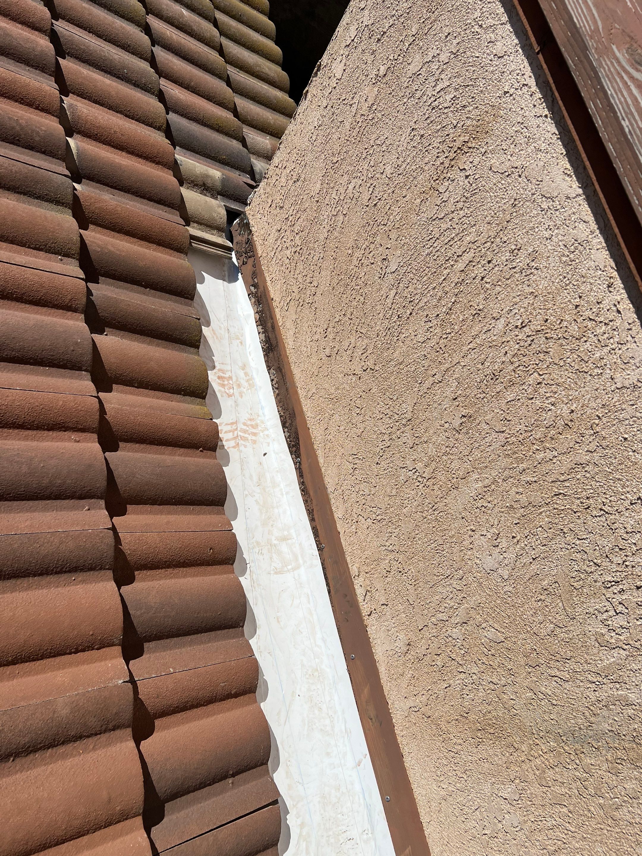 Tile Roof repair by Grandmark Service Company