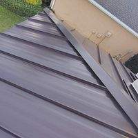24ga 1.5" Mechanical Seam Dark Bronze by Total Roofing System The Metal Roof Experts