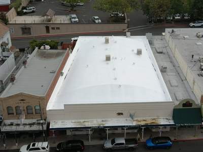 Foam and coatings on commercial roof
