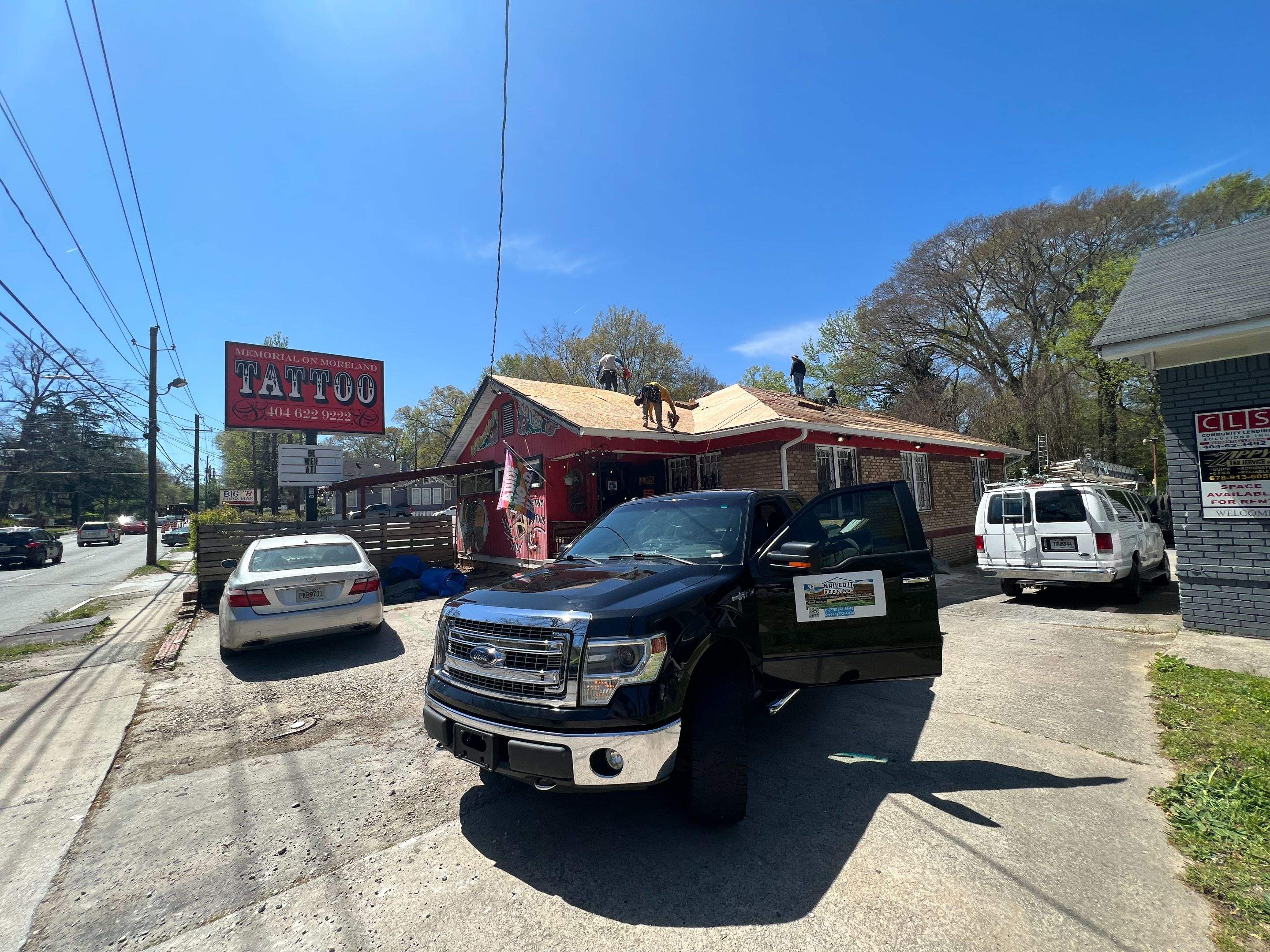 memorial tattoo roof & gutter replacement by Nailed It Roofing & Remodeling LLC