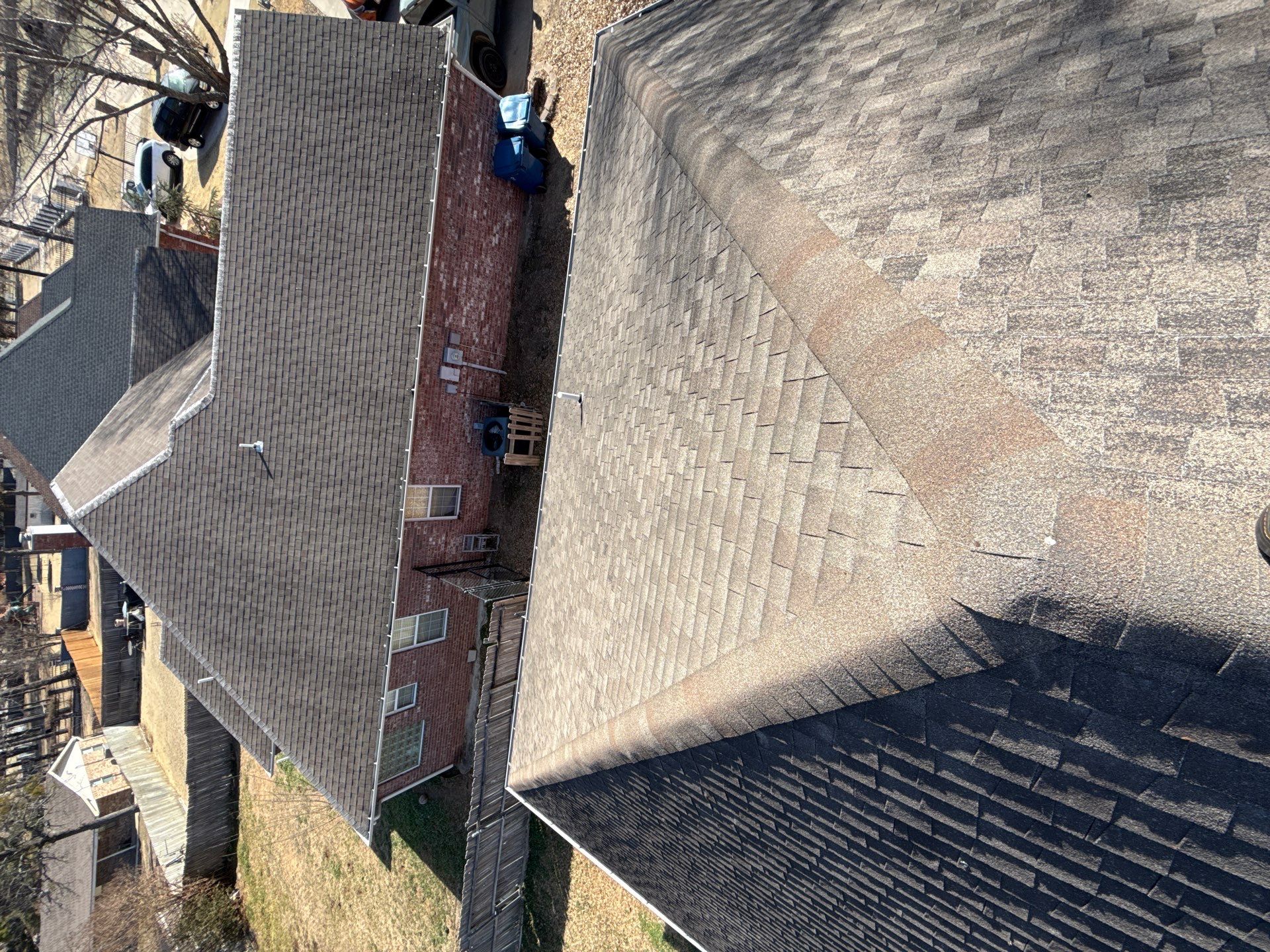 Black roof & gutters!! by In & Out Construction & Remodeling, LLC