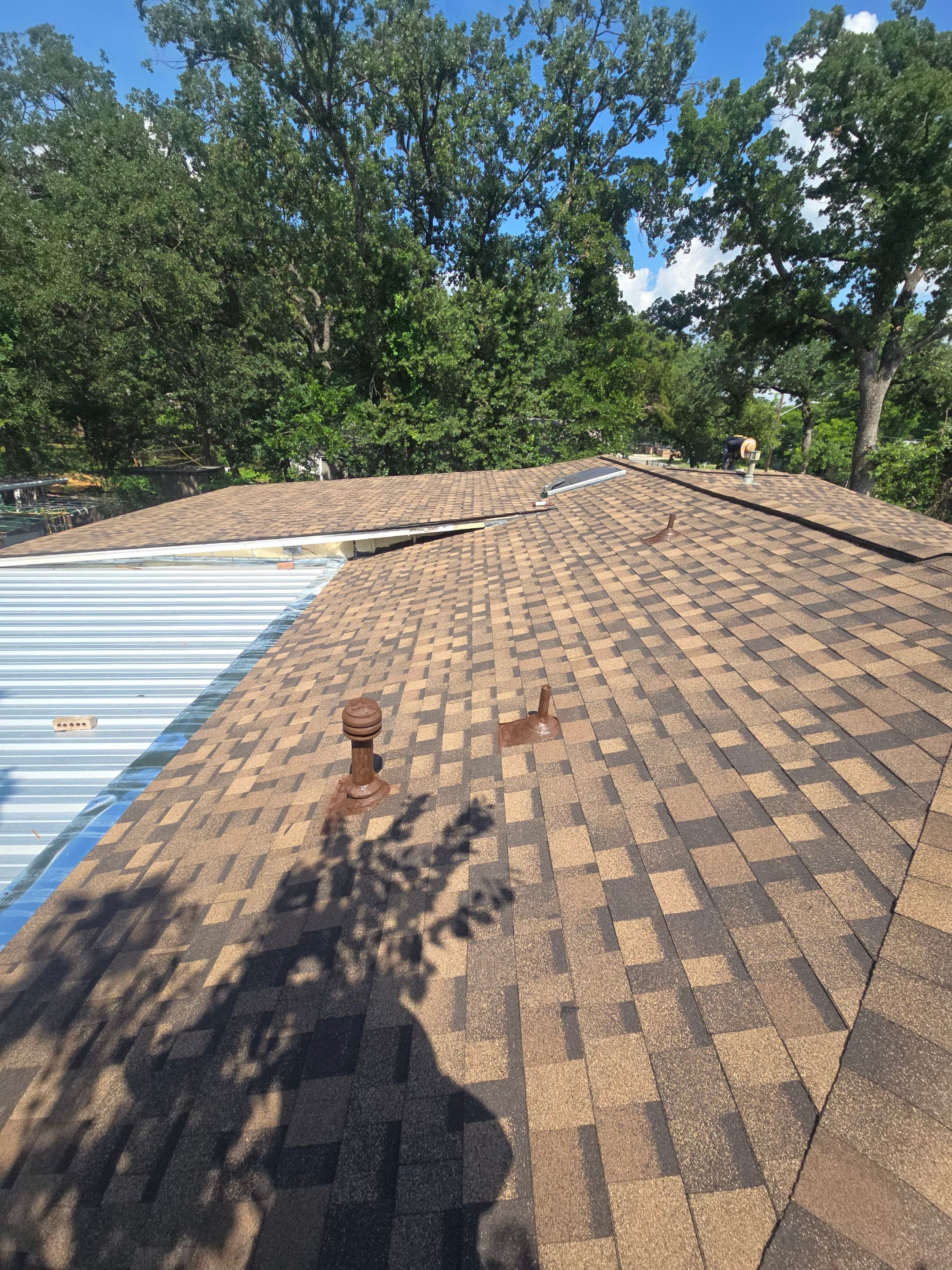 Reroof with Panels by Berry Good Roofing