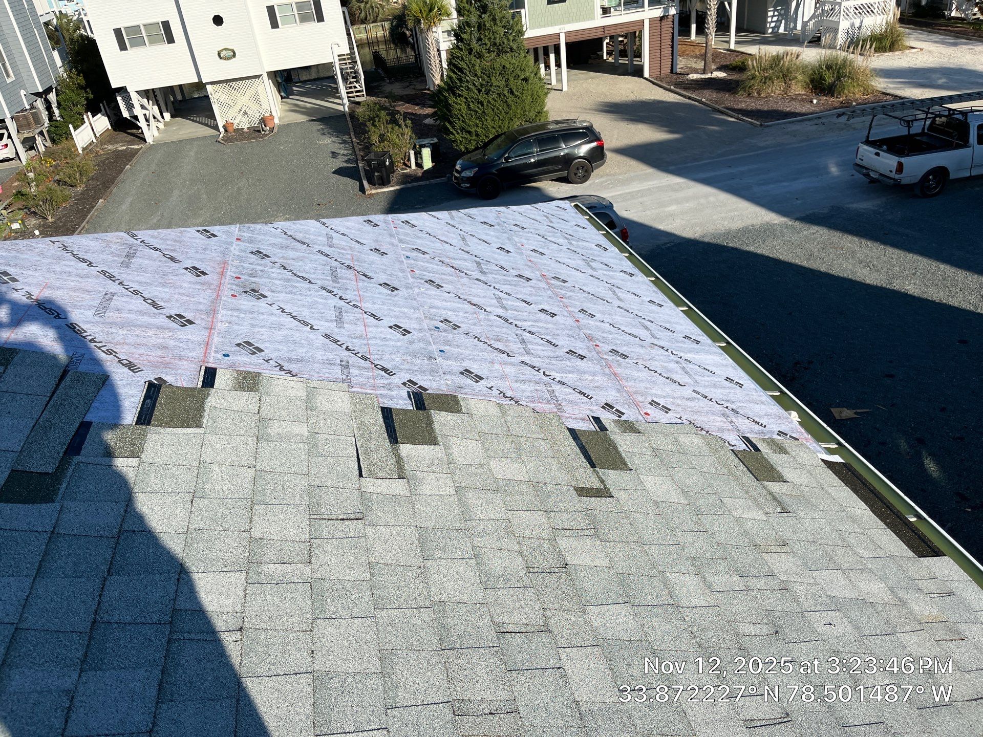 Standing Seam Metal Roof & Silver Birch Shingle Upgrade in Sunset Beach, NC by RGR Construction and Roofing, LLC