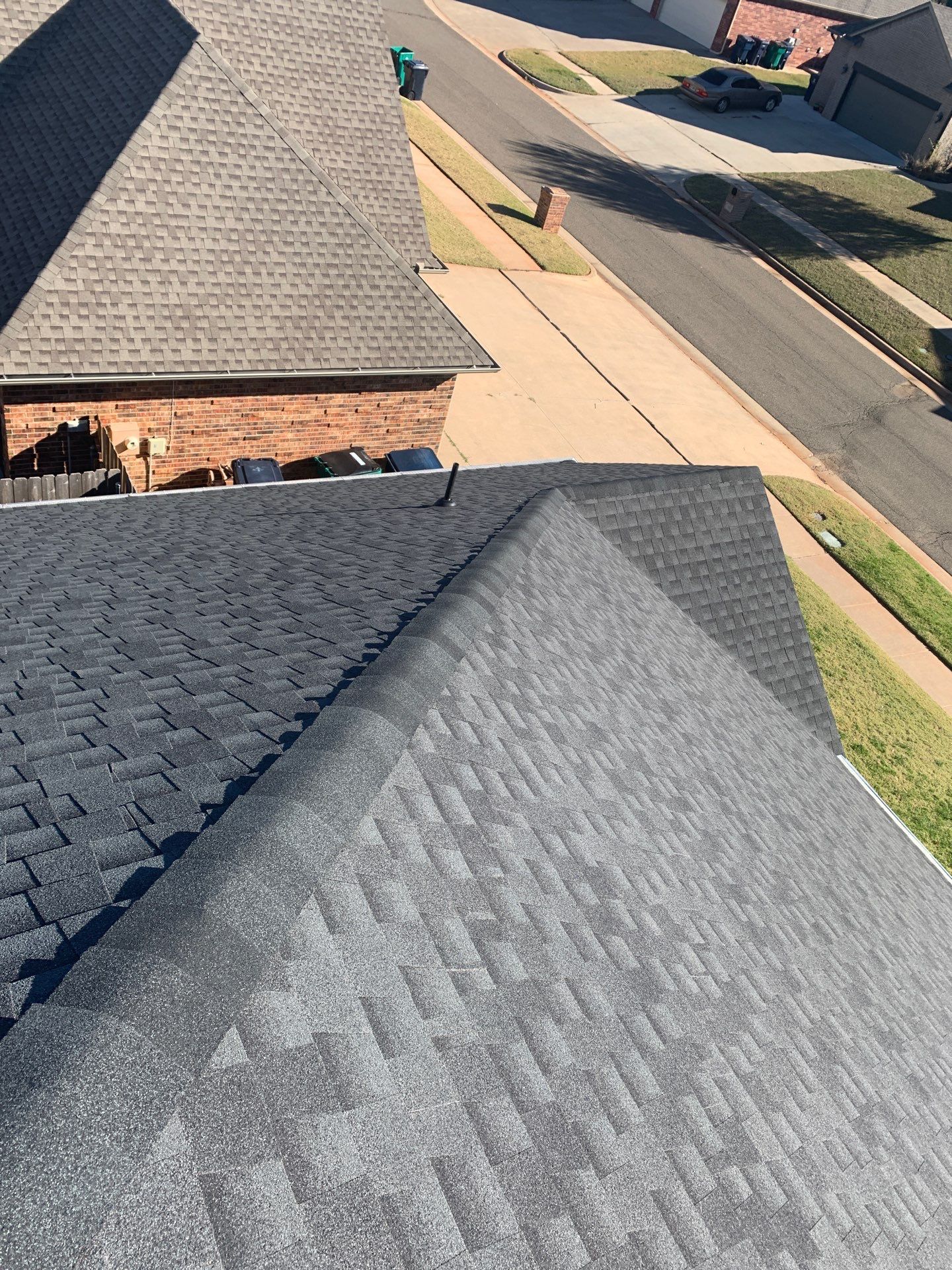 roof replacement & gutter installation in Edmond by McCann's Roofing and Construction