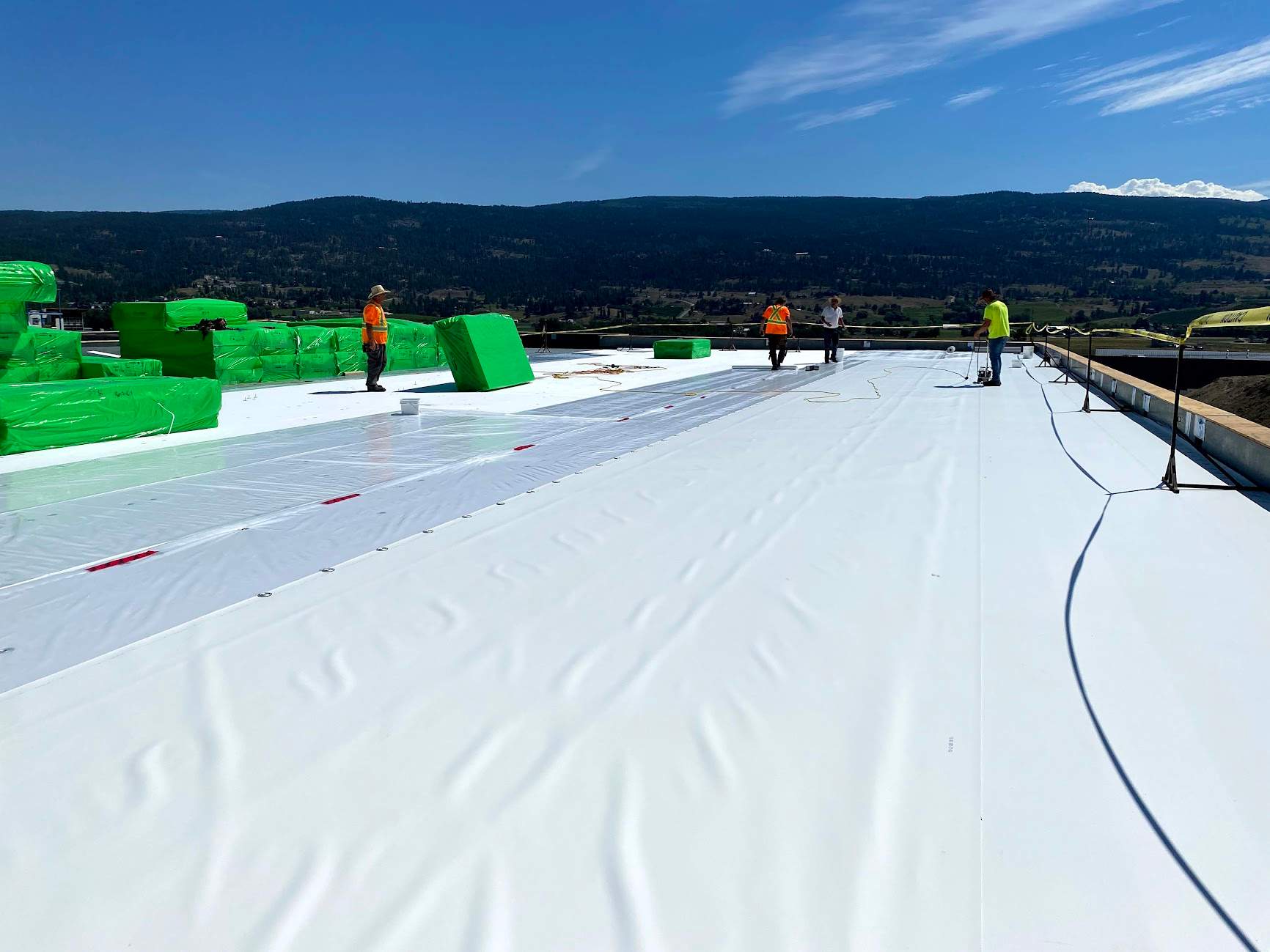 Commercial Roofing Installation using Durolast by Top Notch Roofing Inc