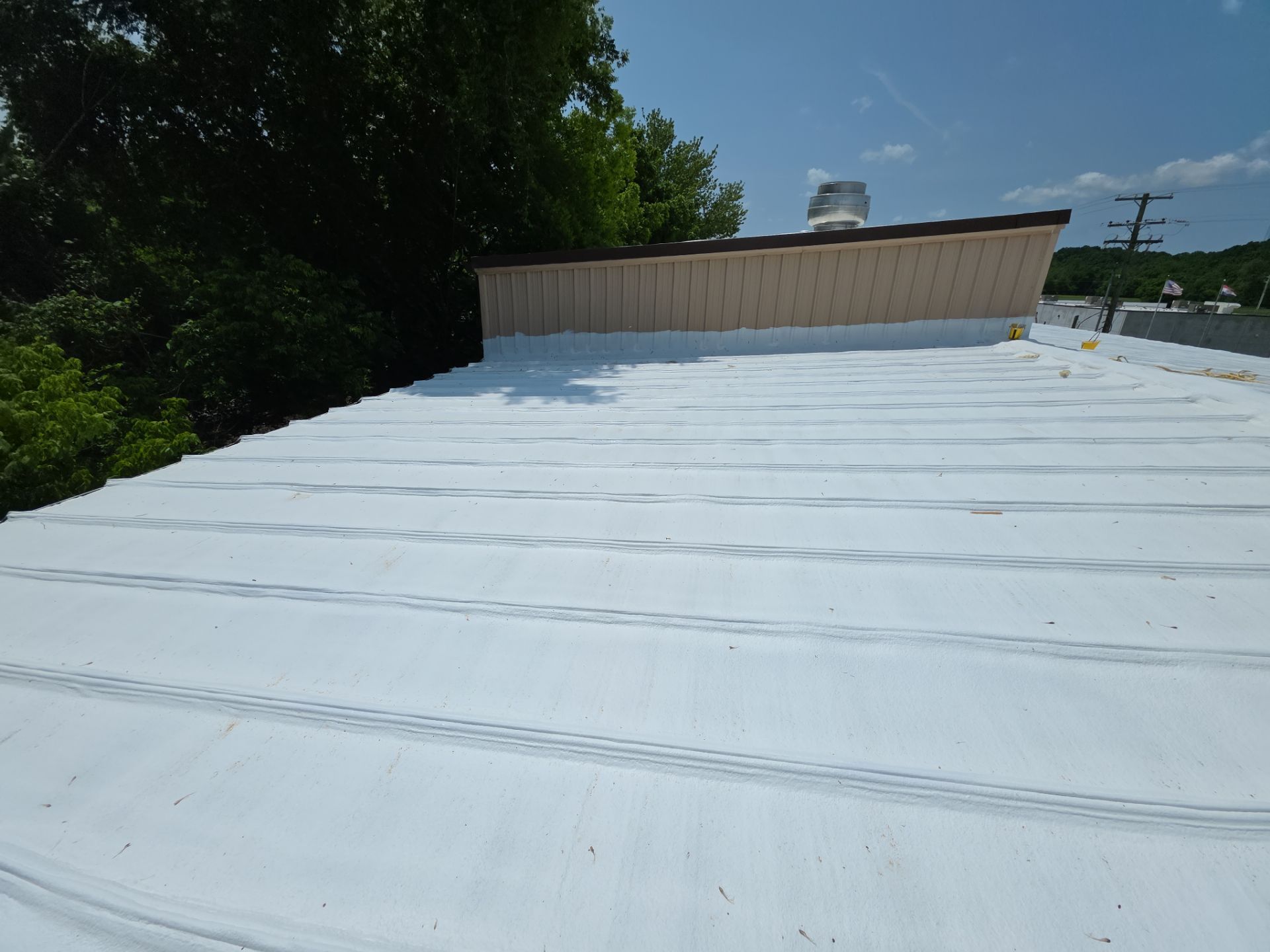 Commercial SPF Foam & Coatings Restoration System  by Titan Commercial & Residential Roofing 