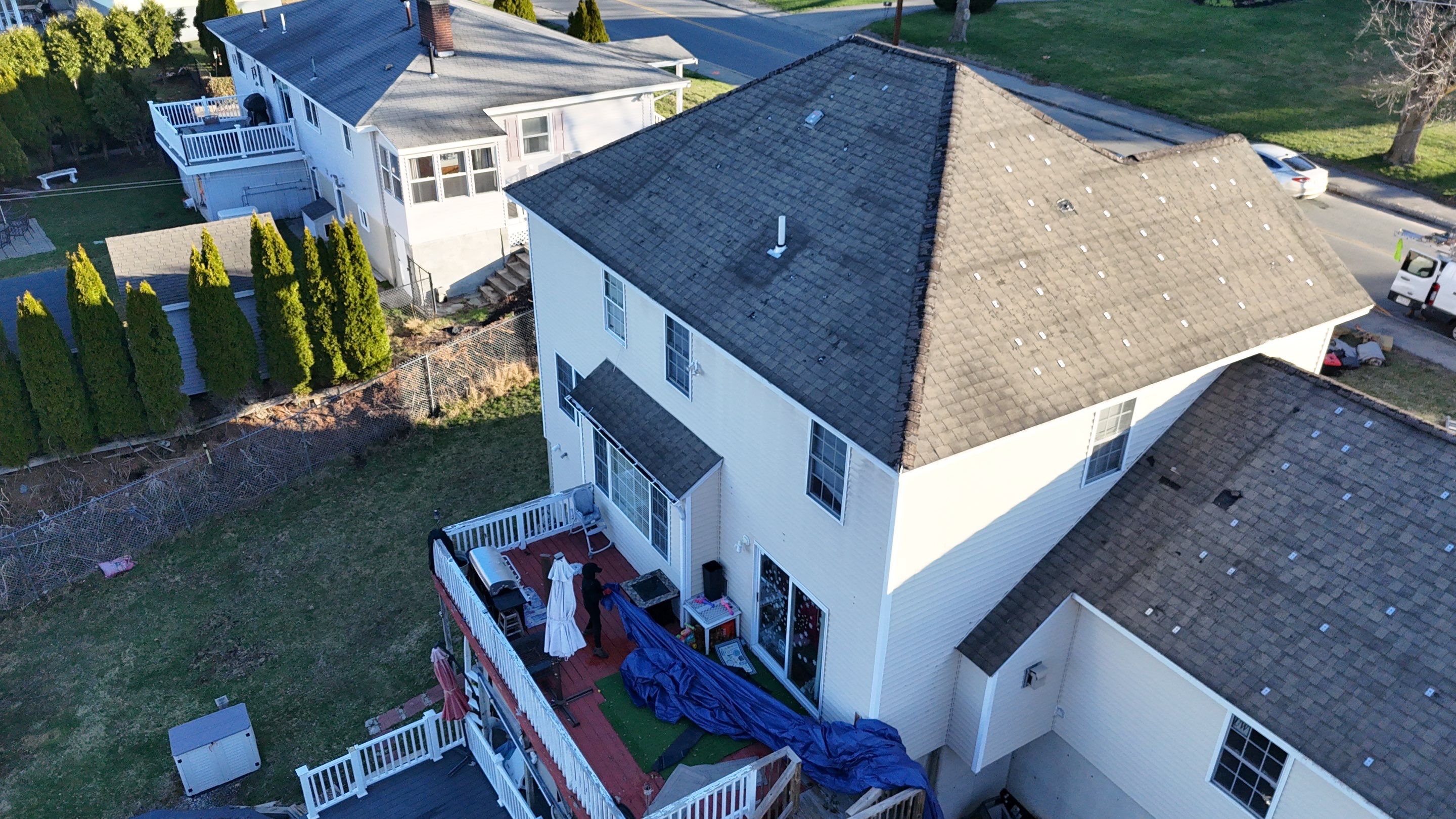 Full Roof Replacement + Seamless Gutters by Mighty Dog Roofing of Greater Middlesex County