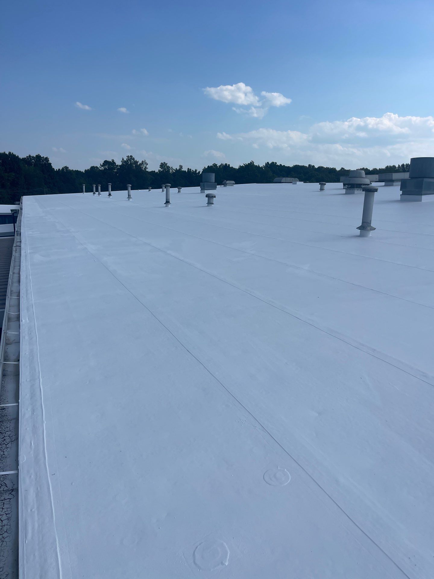 Commercial Roofing Installation using Coatings by Kentucky Commercial Roofing